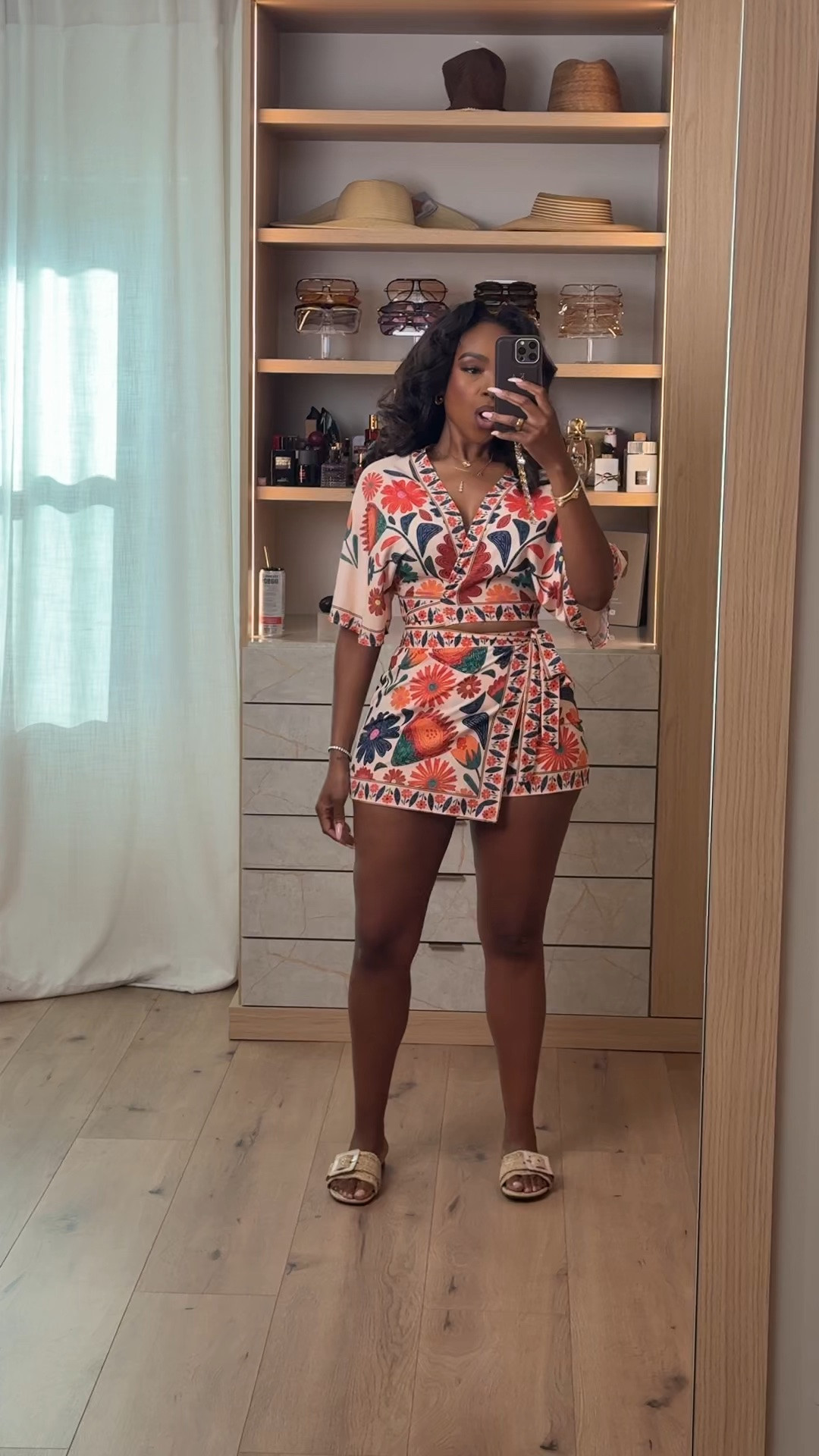 The kind of effortless vacation outfit that makes getting dressed feel EASY 🌺✨

This printed romper gives that elevated resort-wear vibe without sacrificing comfort. The flattering wrap detail, colorful floral print, and lightweight feel make it perfect for hot summer days while still looking polished. Styled with neutral slides for an easy throw-on-and-go look you’ll wear on repeat all season long. Definitely one of those pieces that works for so many occasions, making the cost per wear worth it.

Perfect for beach vacations, brunch dates, tropical trips, cruise outfits, summer dinners, vacation strolls, and poolside lunches.

5’4 | 140LBS | 34D-27-40 | size small or 4

Floral romper outfit, vacation romper women, resort wear fashion, tropical vacation outfit, summer romper style, colorful vacation clothes, beach outfit ideas, feminine summer fashion, cruise outfit inspiration, vacation dinner outfit, effortless chic style, vacation ready looks

Follow me on Instagram and YouTube @kirasfashionfinds