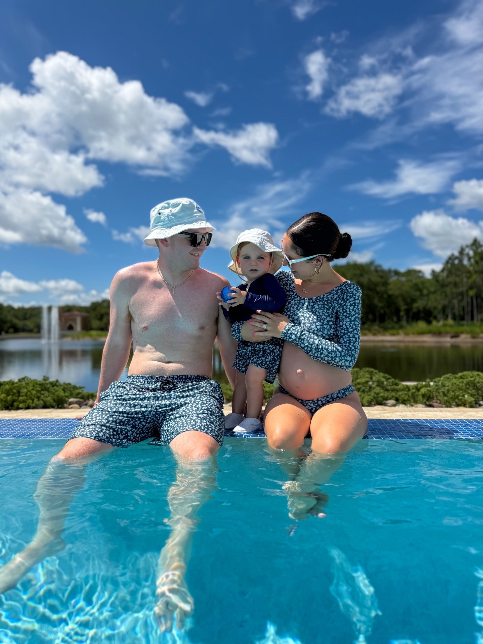 Matching family swim day at Four Seasons Orlando ☀️💙 Linking my floral bikini, Declan’s rash guard set, our sun hats, and sunglasses. (James’s exact suit is sold out)

family matching swimsuits, family swimwear, mommy and me swim, toddler rash guard, boys swim set, pregnancy swimsuit, maternity swimwear, bump friendly bikini, family vacation outfits, resort style, sun hat, beach vacation, Four Seasons Orlando, babymoon outfits, matching family looks

#LTKSwim #LTKBump #LTKKids