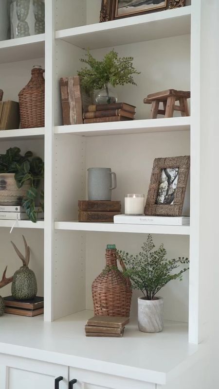 Shelves are the place to showcase your personality with beautiful complementary items. Capture precious memories in our sea grass photo frames, then sprinkle in a mix of other contrasting textures and heights -- terracotta vases, wood pedestals, glass bottles, faux greenery and more. 

10% off with code CRISTIN

