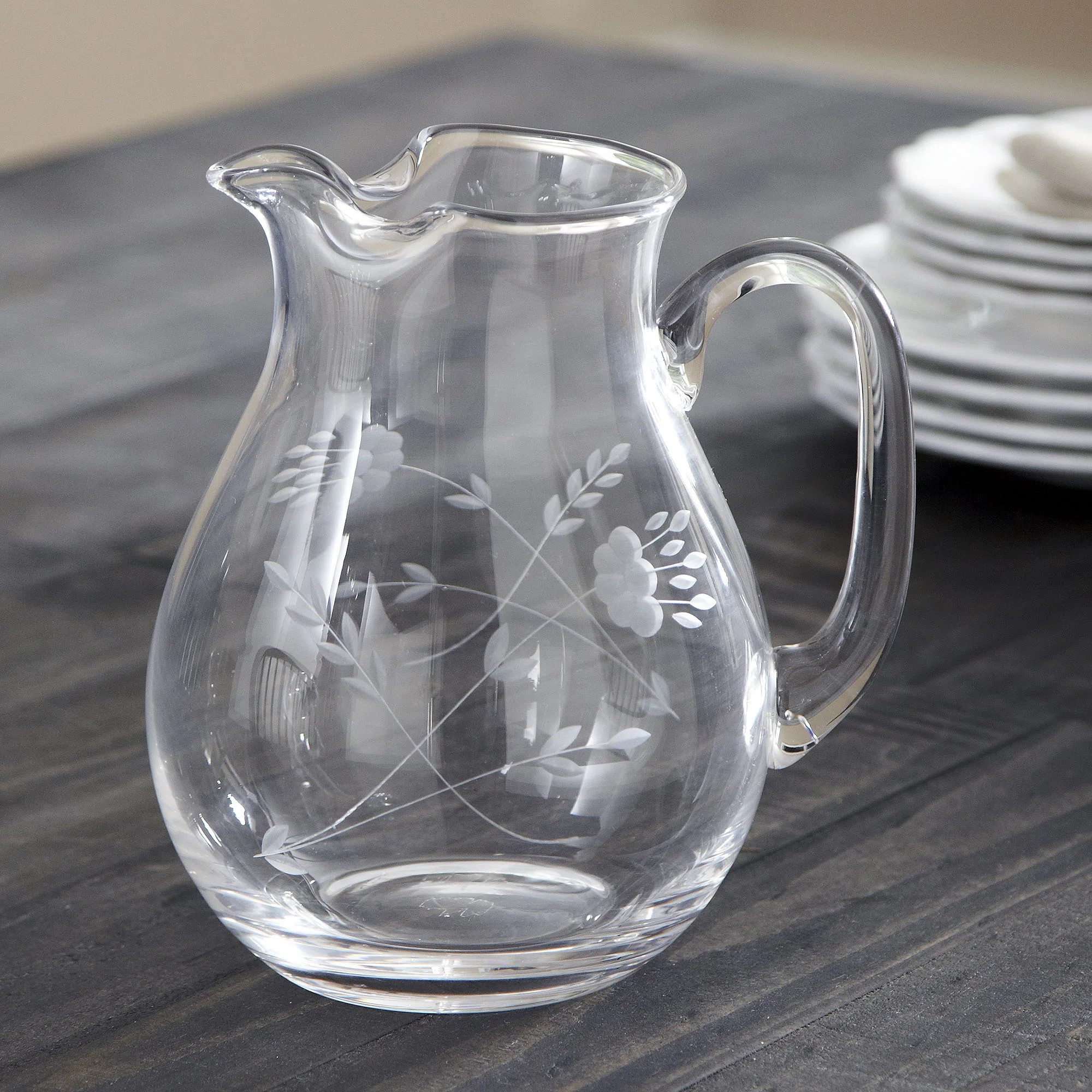 Crafted with a simple silhouette and exaggerated curves, this Pitcher offers everyday elegance fo... | Wayfair North America