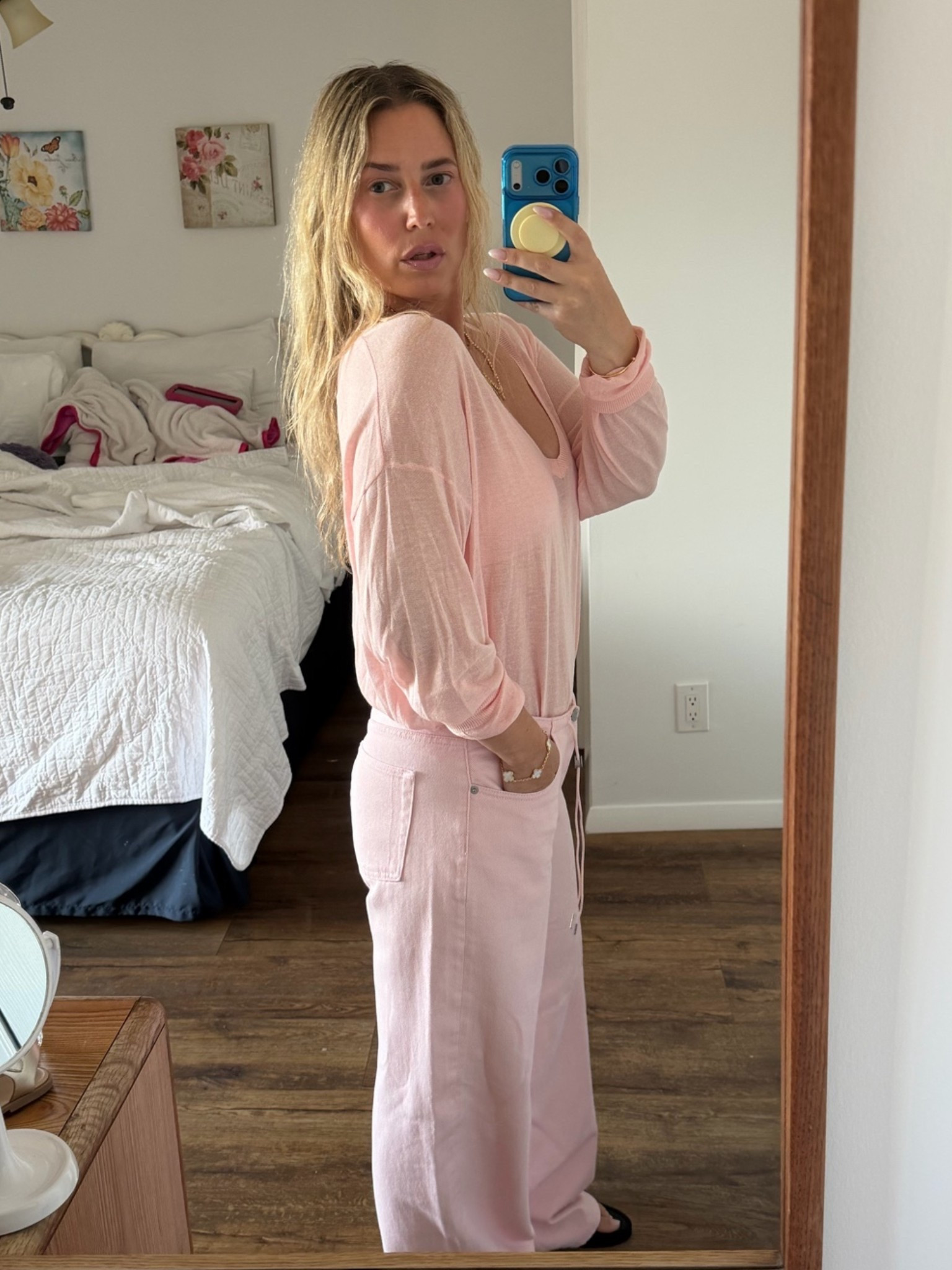 My pink v neck sweater on sale for $14 right now — daily edit cover from Found by Em