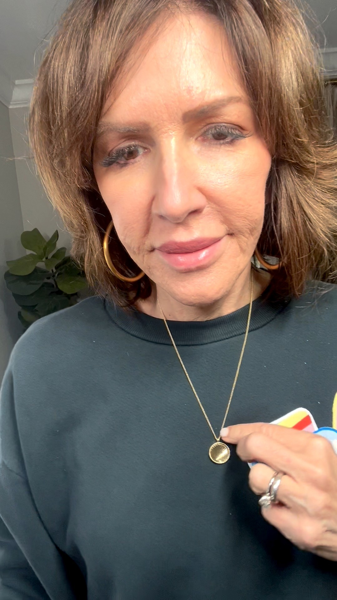 sun gold pendant necklace, gold hoop earrings 

#LTKootd #LTKOver40 #LTKSeasonal