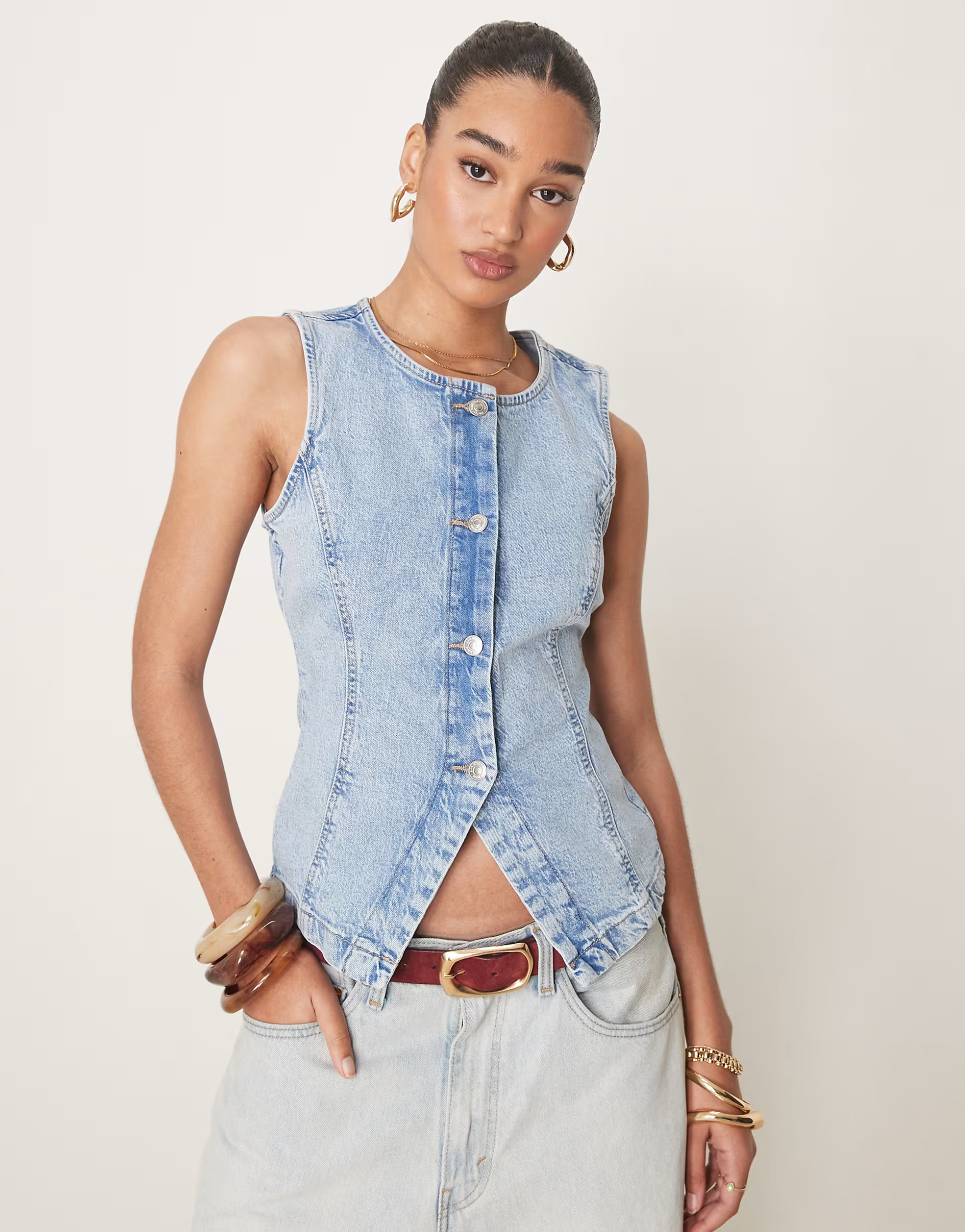 Gina Tricot sleeveless sculpted denim waistcoat in lightwash blue | ASOS (Global)