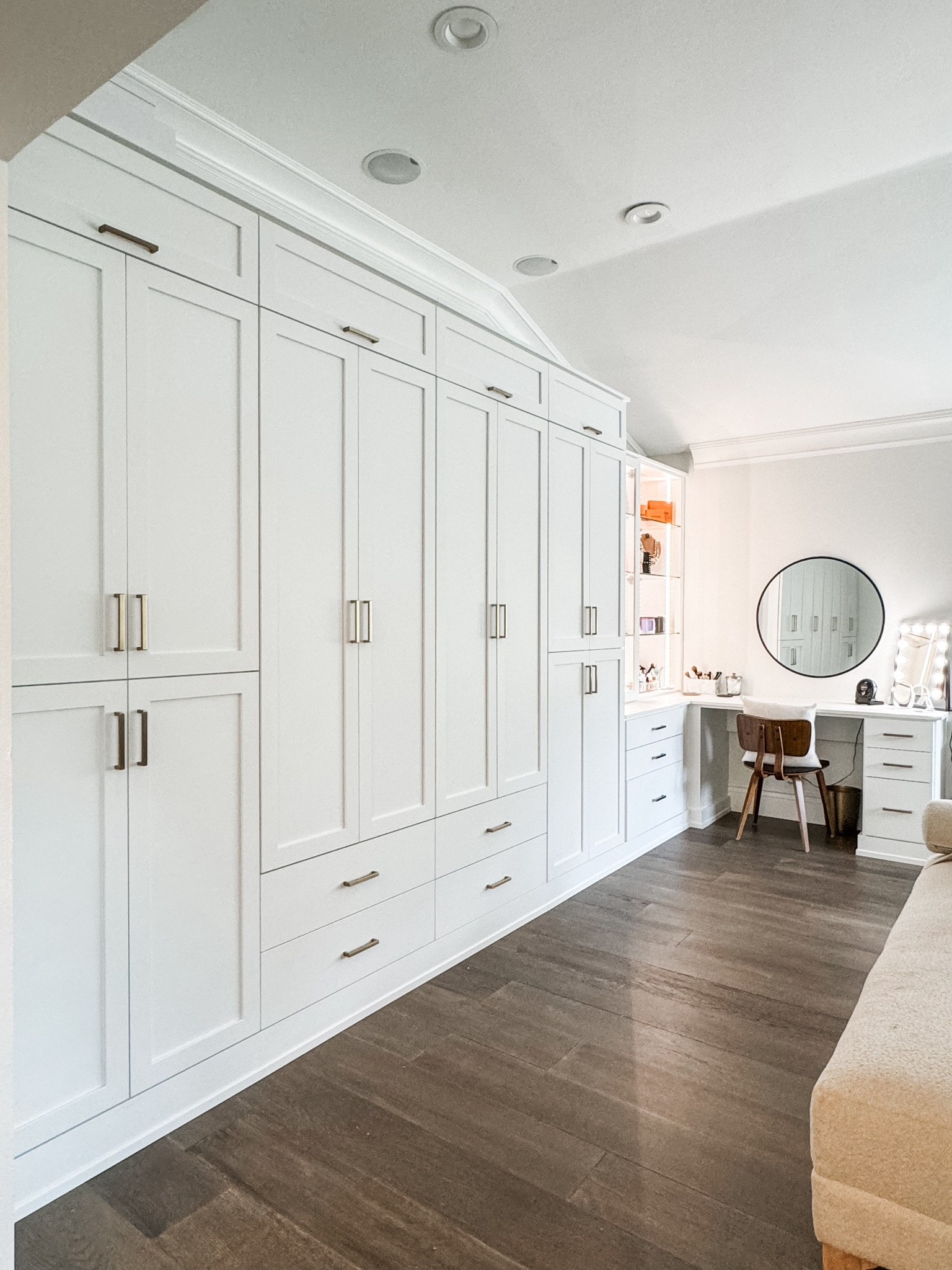 This custom closet is a dream! We helped a mom turn a sitting room off of their primary bedroom into her dream walk-in closet. This is the Preston collection from The Container Store. I LOVE the lighting and the vanity. I dream of a space like a vanity to sit and get ready. I’m always standing 😵‍💫😵‍💫 The material is beautiful as well! 

#LTKHome