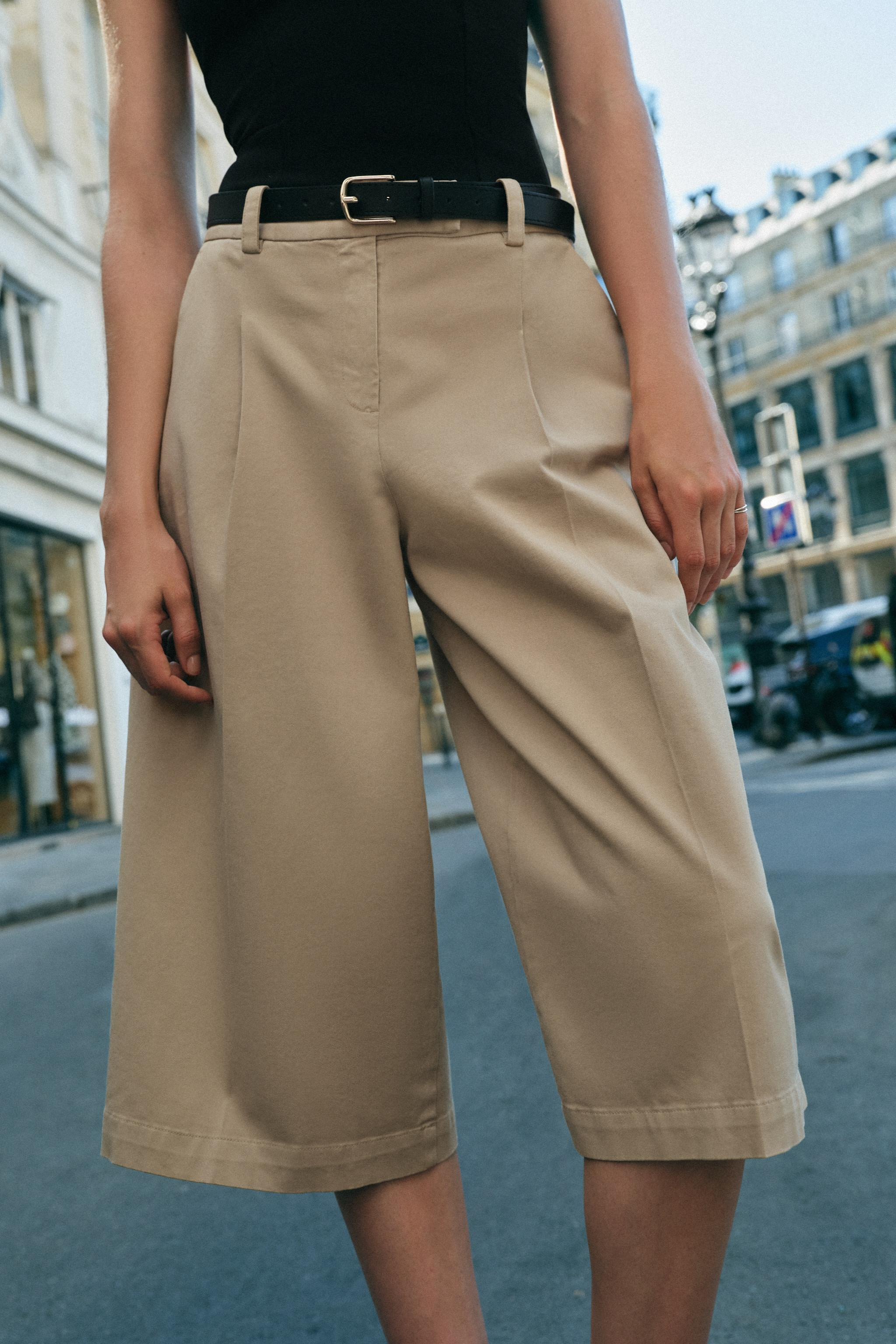 Model height: 178 cmHigh-waisted Bermuda shorts with front pleats and a belt. Front pockets and d... | Zara Canada