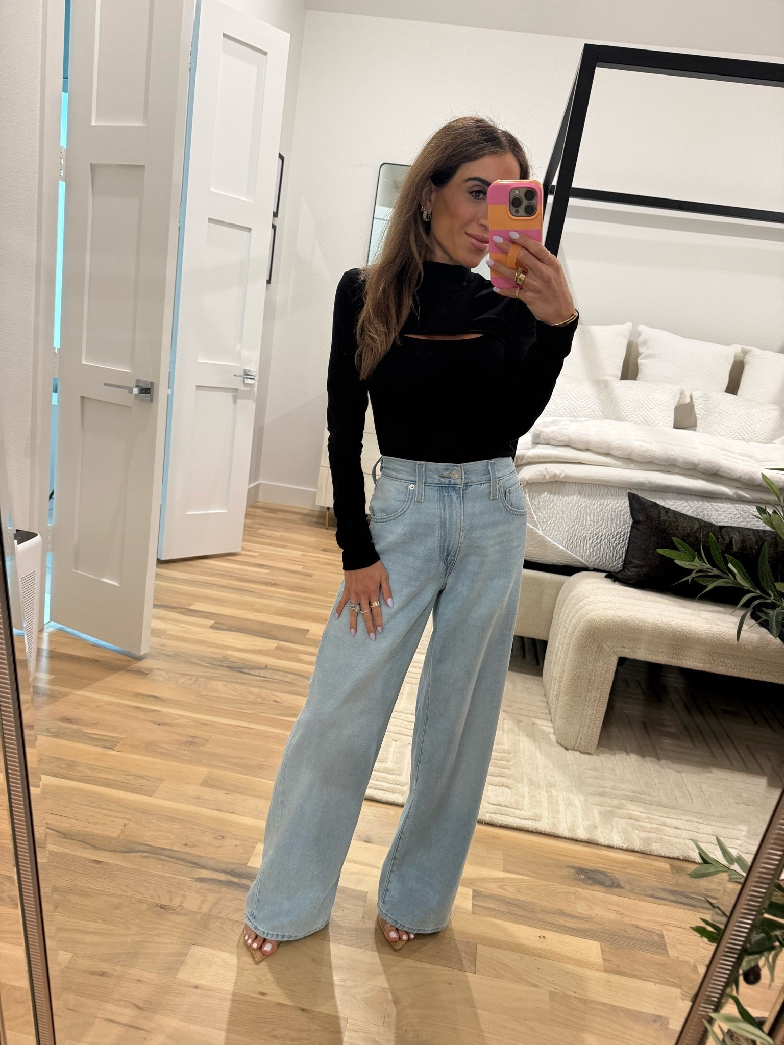 Date night outfit idea cutout bodysuit is very warm and not too revealing. Wearing xs in top size 24 in the wide leg cinch jeans