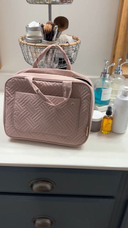Large toiletry bag for travel. Fits full size bottles. Great for traveling by car or checking a bag on plane when you can bring large quantities of products. Perfect for families. Large water resistant pockets. Comes in a variety of colors. And two different sizes  

#LTKsalealert #LTKtravel #LTKfindsunder50
