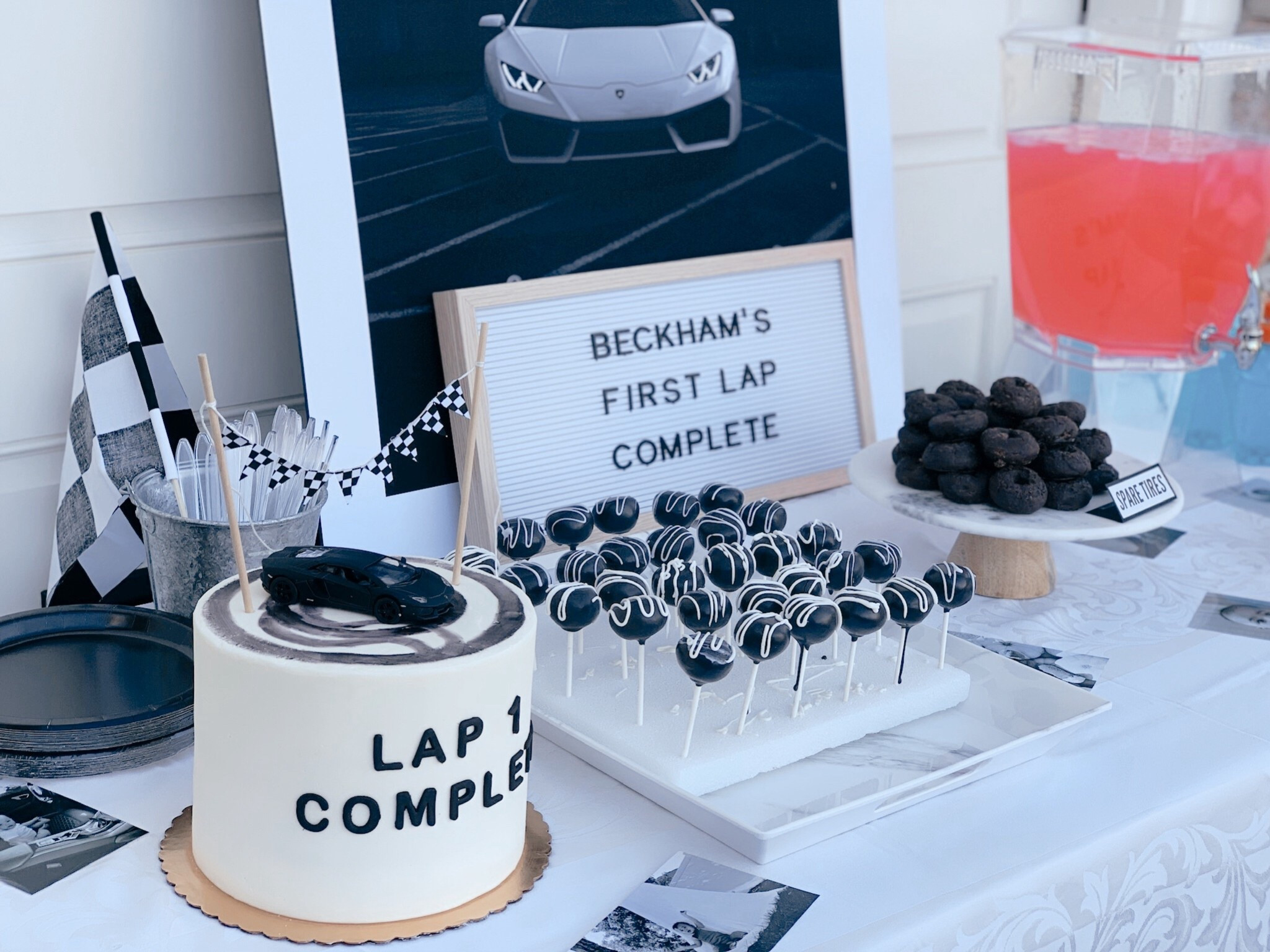 Boys modern black and white race car themed first birthday partyy

#LTKKids #LTKParties