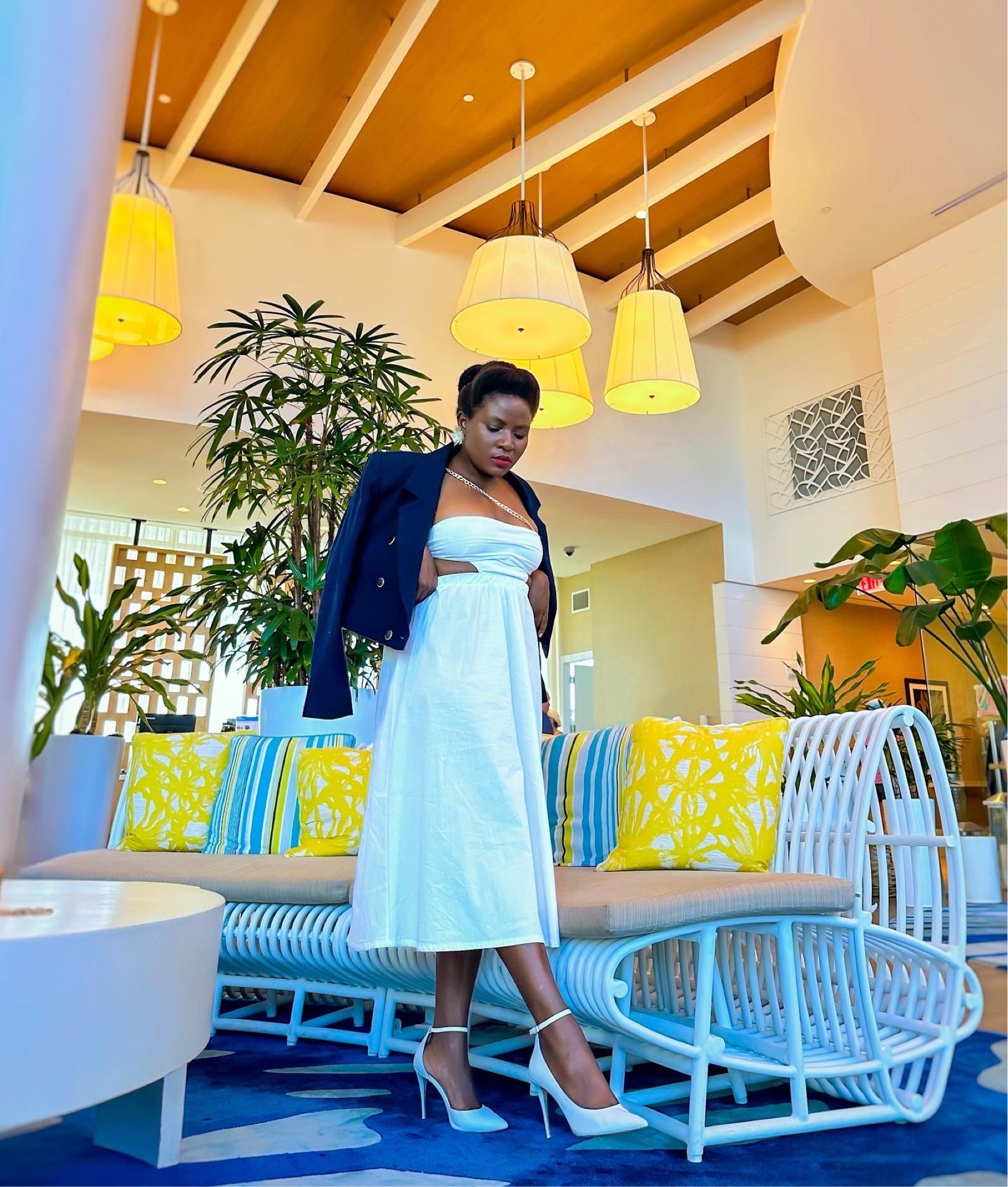 Getting dressed for Brunch is a form of self care for me. I love the cut out details on this white dress and the chain detail is a DIY .

 It can be dressed down with sneakers or sandals for a simple Brunch by the beach on vacation

White summer dress, white high heels, cropped blazer, Vacation outfit, date night outfit in Florida  

#LTKU #LTKstyletip #LTKtravel