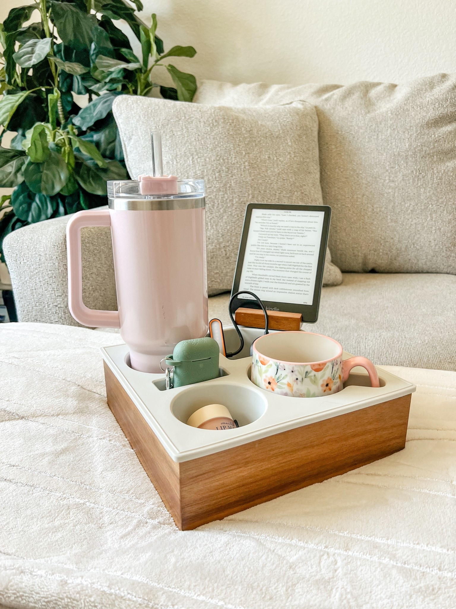 I’ve had this to a few years now and I still use it daily! This couch caddy is the BEST!

It holds multiple drinks, including my huge coffee mugs, it can hold my kindle or phone, has compartment for snacks, AirPods, remotes, or anything else you need! 

I love always having all my stuff right next me when I need it! And it keeps my drinks from spilling on the couch! 🙌🏼

#LTKGiftGuide #LTKFamily #LTKHome