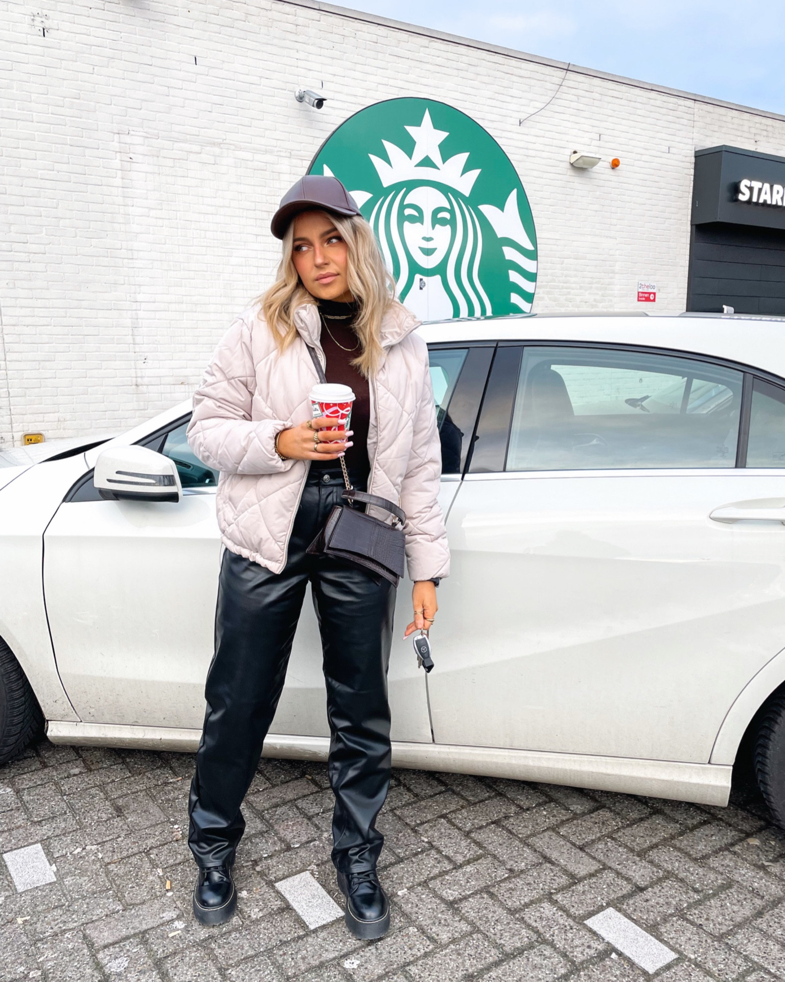 Starbucks to go wearing beige H&M puffer coat, dark brown Mango top and H&M leather look trousers. All in size S

#LTKSeasonal #LTKeurope #LTKunder50