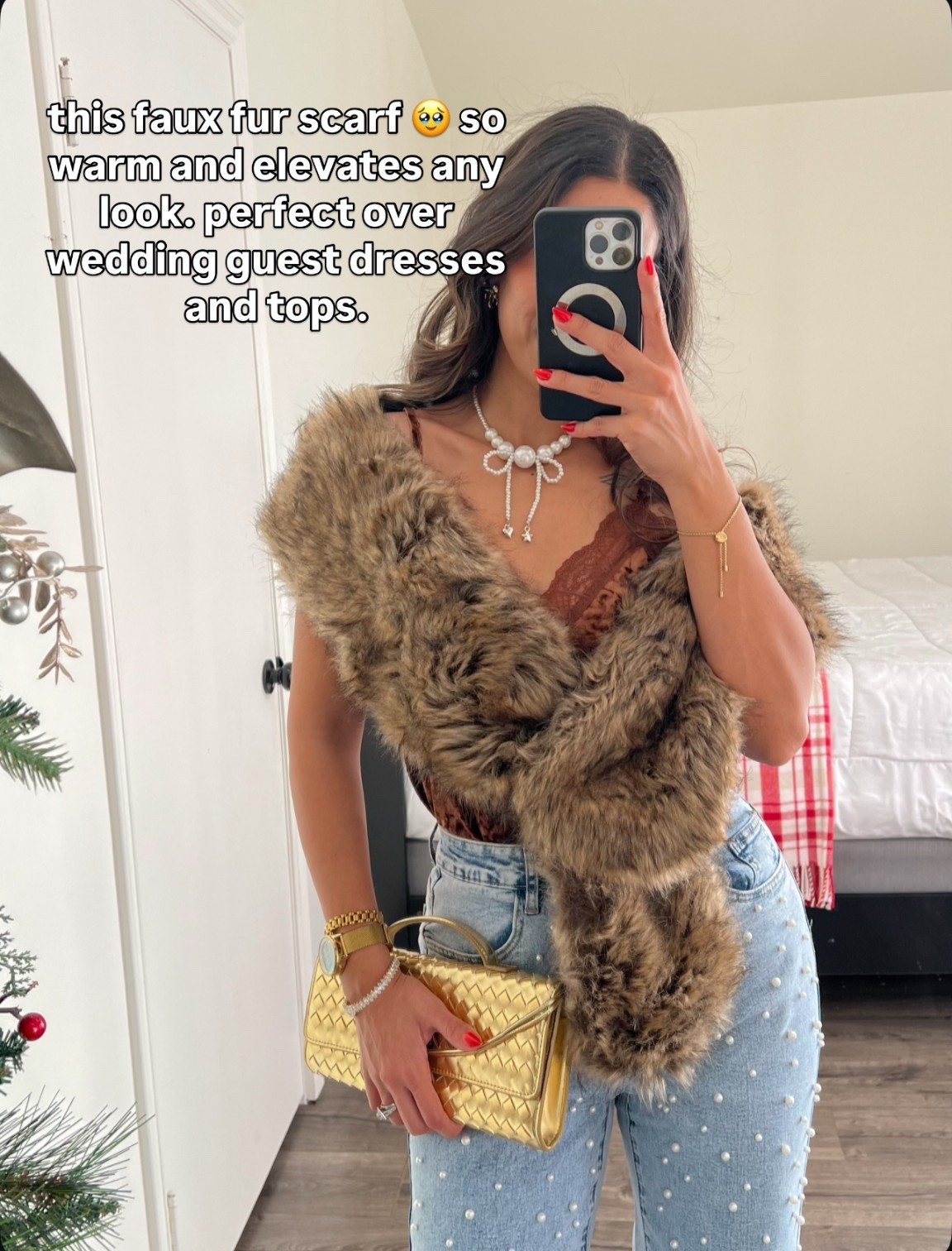 This faux fur scarf! I stitched it with a stitch tool to keep it from falling off my shoulder, kind of like a shrug! So cute for any tops and dresses 

#LTKSeasonal #LTKHoliday #LTKFindsUnder50