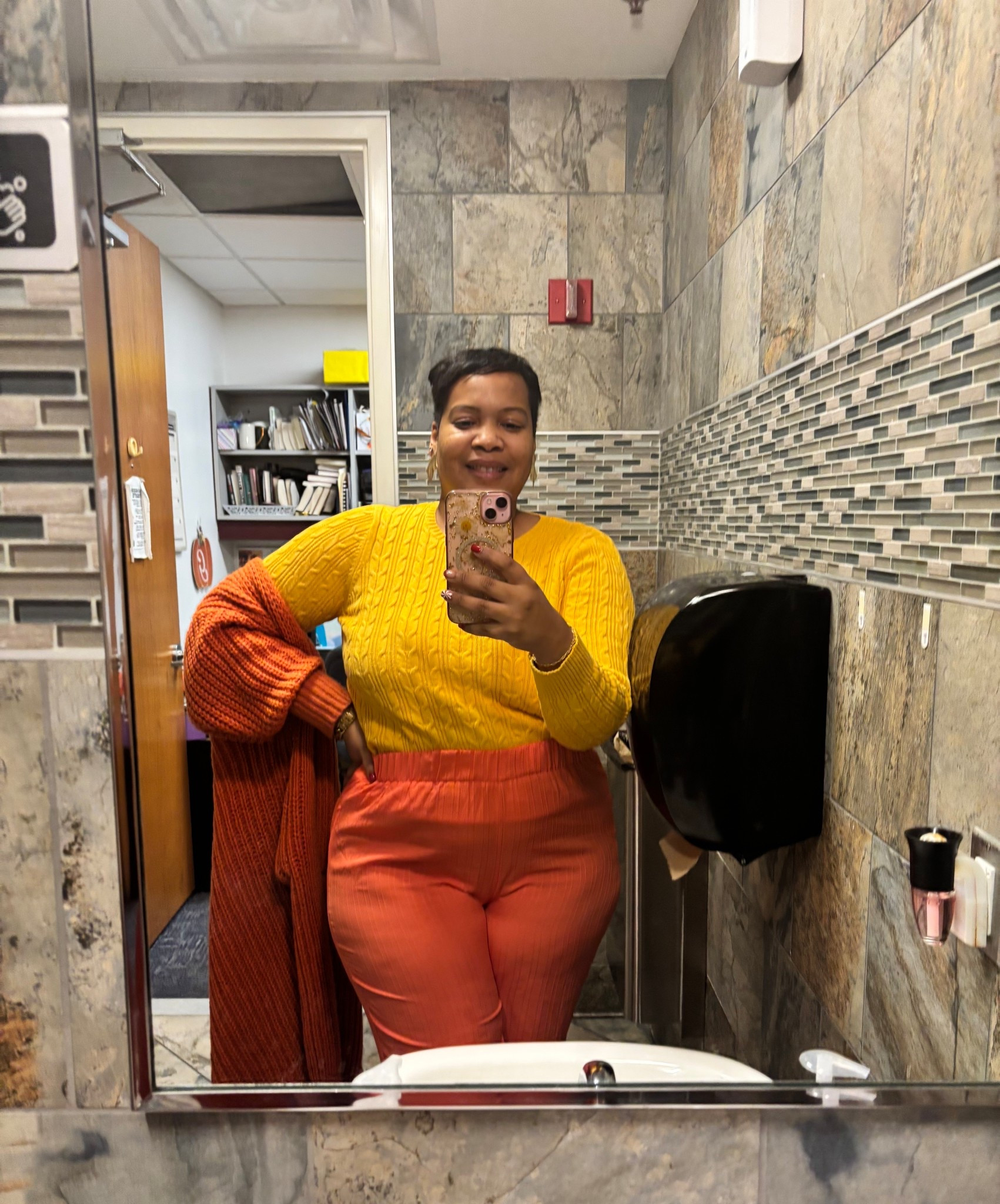 Wearing double sweaters at work because our workroom is so cold. The St. John’s Bay cable knit sweater is so cozy and has great stretch. My trusty Shein cardigan is warm too. Cardigan, cable knit sweater, orange cardigan, yellow sweater. 

#LTKWorkwear #LTKSaleAlert #LTKootd