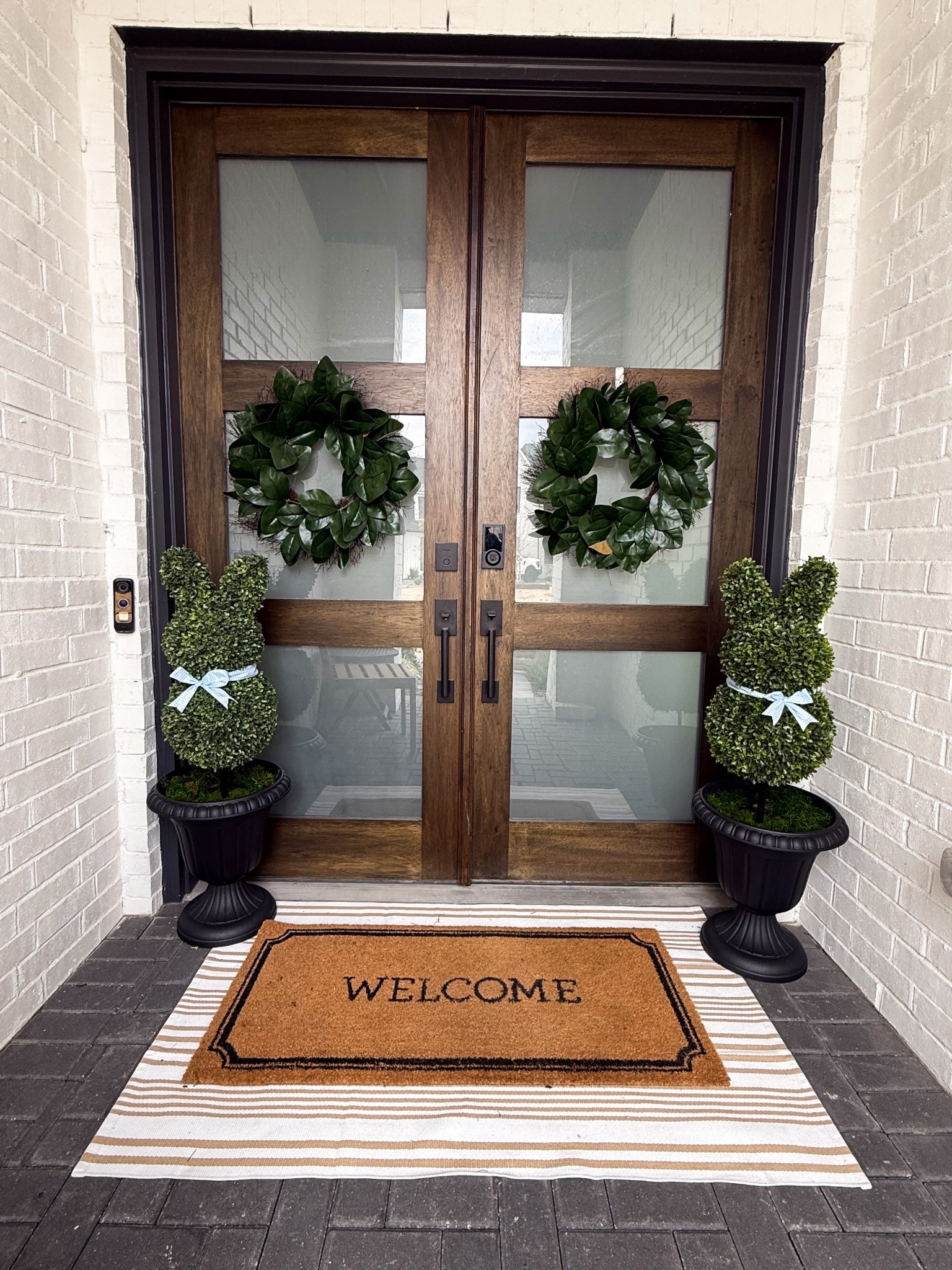 Bunny topiary 
Spring front porch 
Easter front porch 

#LTKSeasonal #LTKHome #LTKFindsUnder50