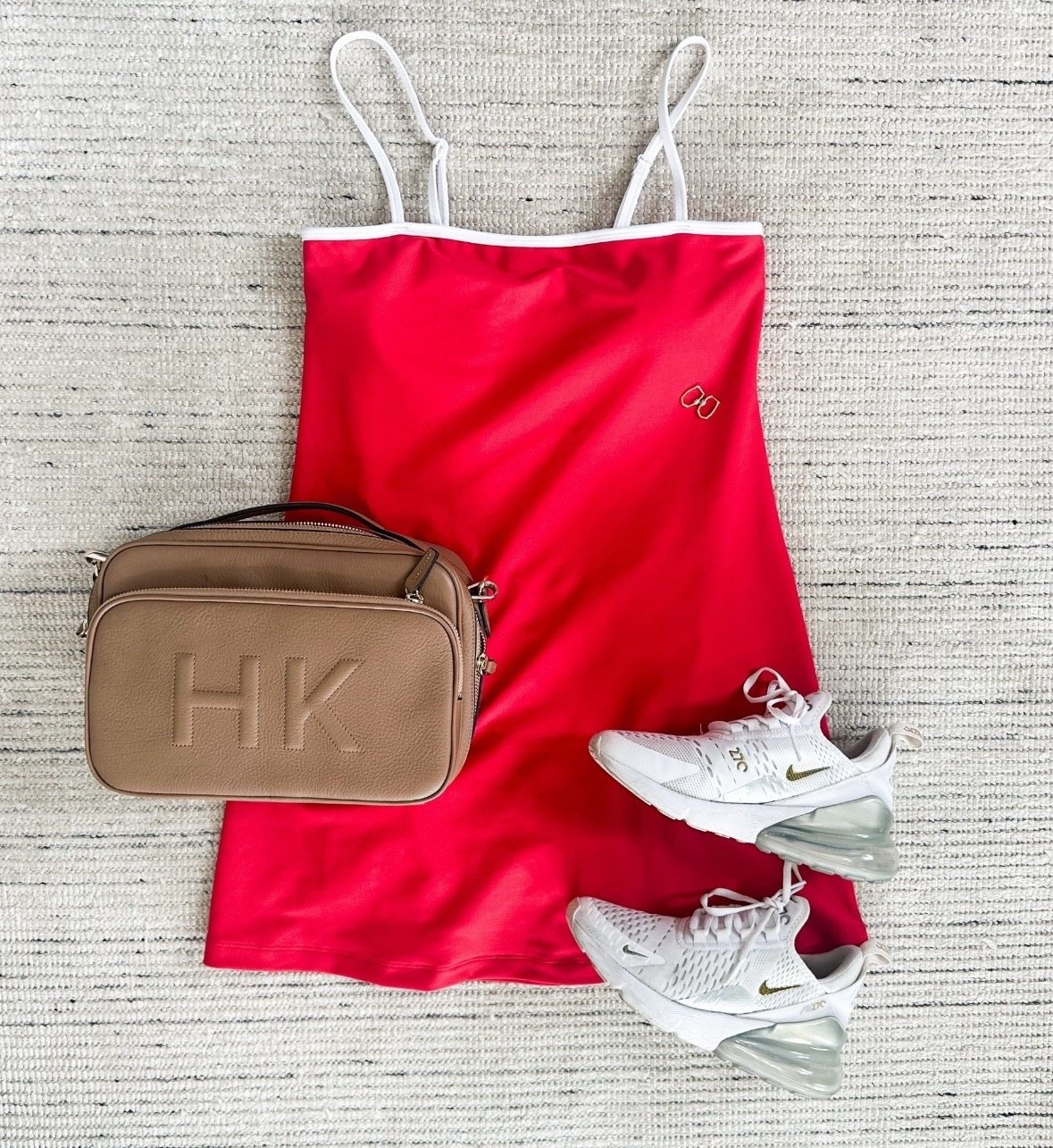 Red athletic dress that is perfect for summertime and the 4th of July! Can be styled with sneakers or sandals for a chic look. Great for traveling, too

#LTKSummerEdit #LTKStyleTip