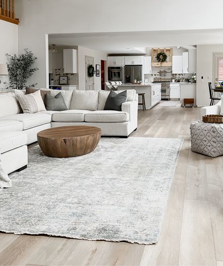 Transitional modern farmhouse living room decor! Arhaus dune sectional with wood accent round coffee table! 

#LTKhome #LTKHoliday