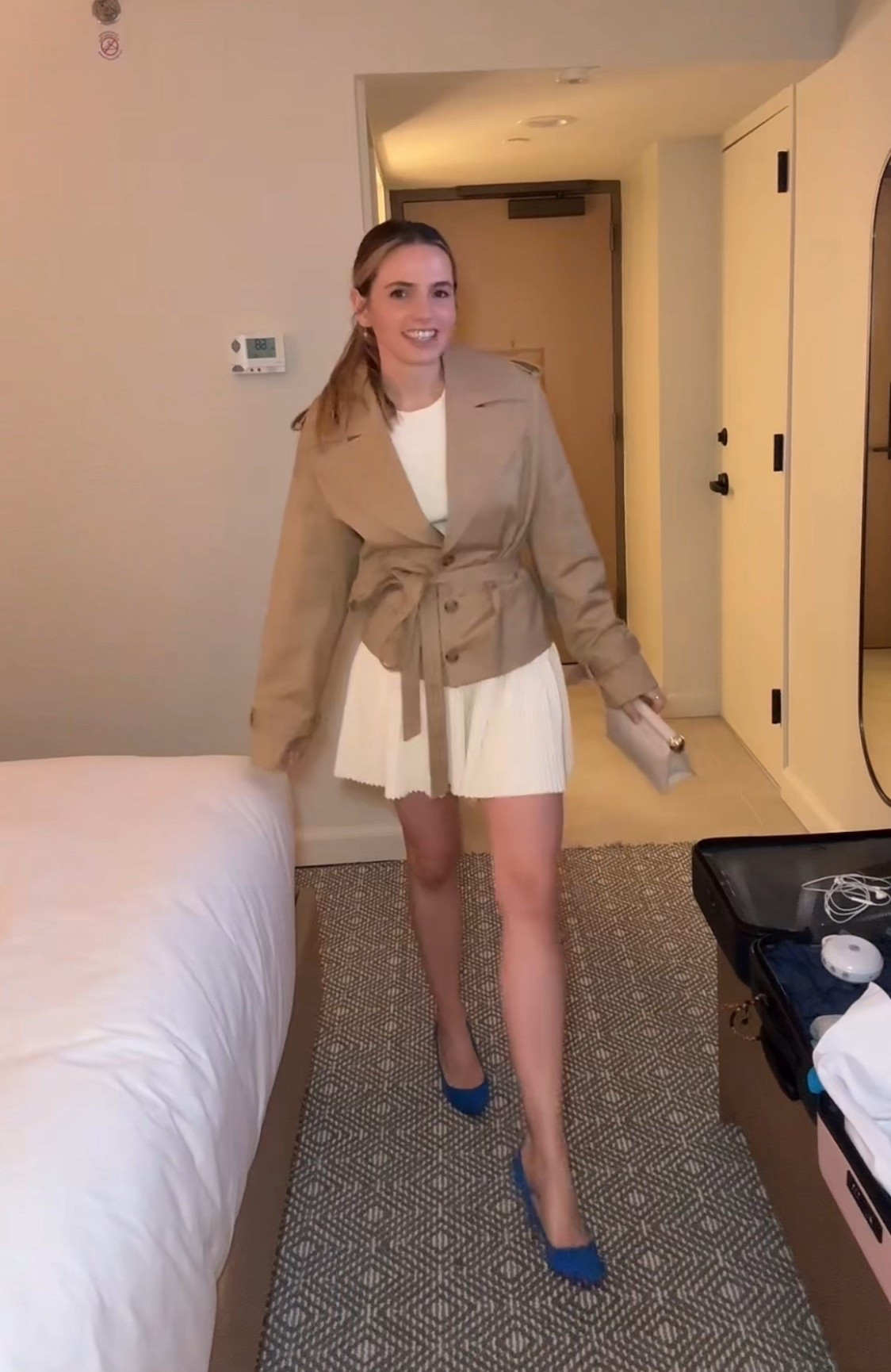 this is one of my favorite outfits i wore in new york 🤍 i love how the neutral tones pop against the bright blue heels - it’s such an easy way to make a classic look feel more fun. this cropped trench has also become my perfect fall jacket. it literally goes with everything and instantly pulls all the fall outfits together.
I’m wearing a size small in each of the pieces (including the neutral knit tank and mini skirt set). the pleated mini is lightweight and super comfortable, and the trench is structured but easy to layer.
#nycoutfit #falloutfitideas #capsulewardrobe #falloutfits #datenightoutfit


#LTKStyleTip #LTKTravel #LTKSeasonal