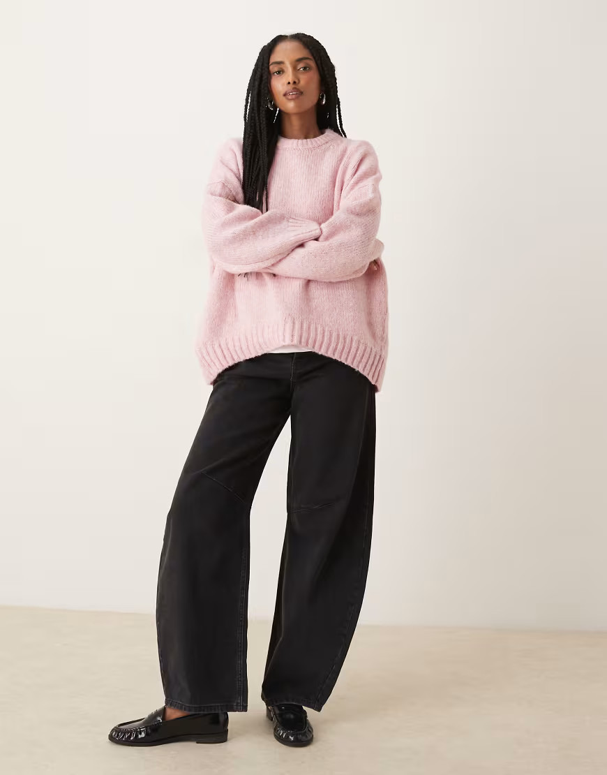 ASOS DESIGN oversized crew neck jumper with curved hem in pink | ASOS (Global)