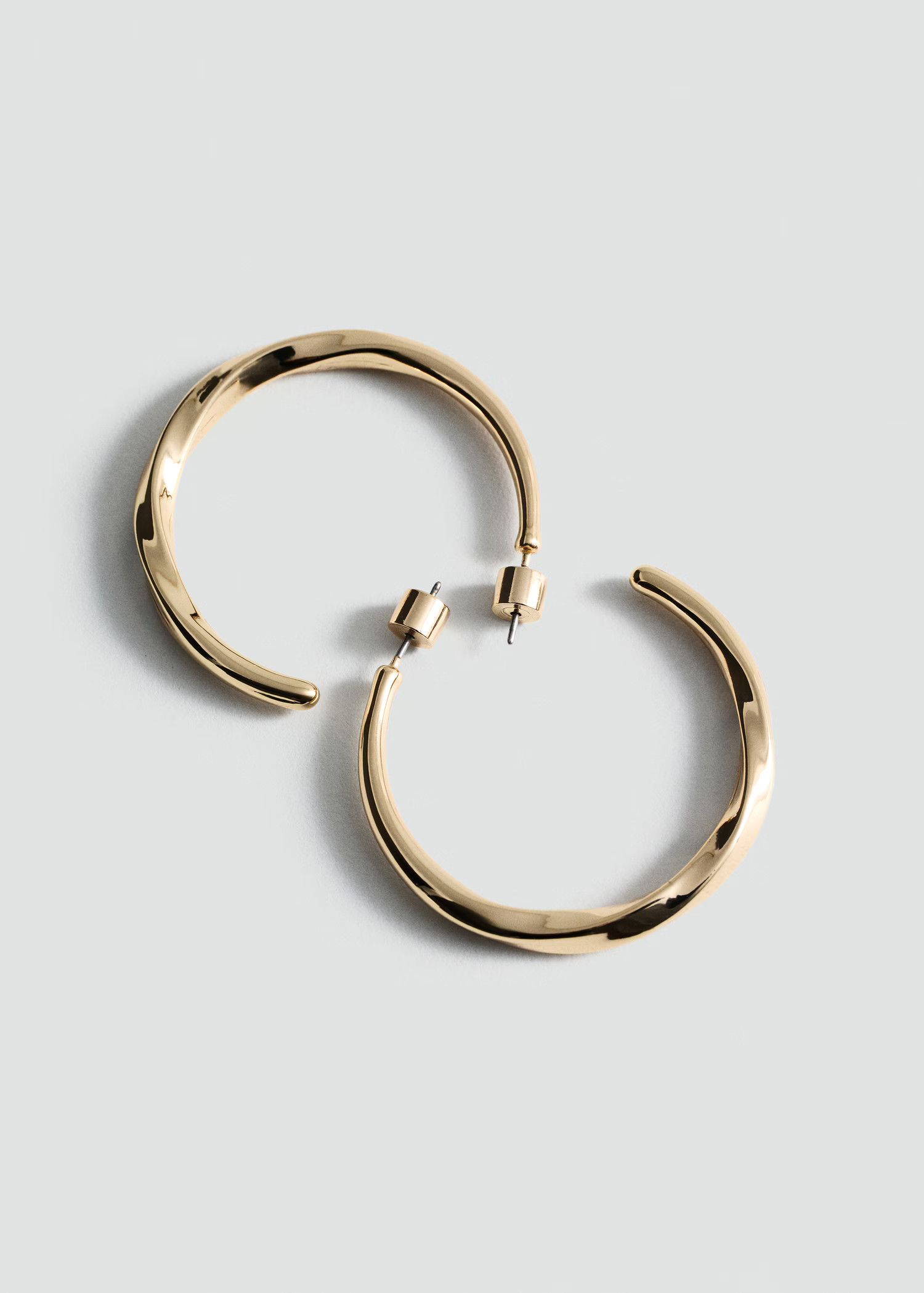 Twisted hoop earrings - Women | MANGO USA | Mango (US/MX/AU)