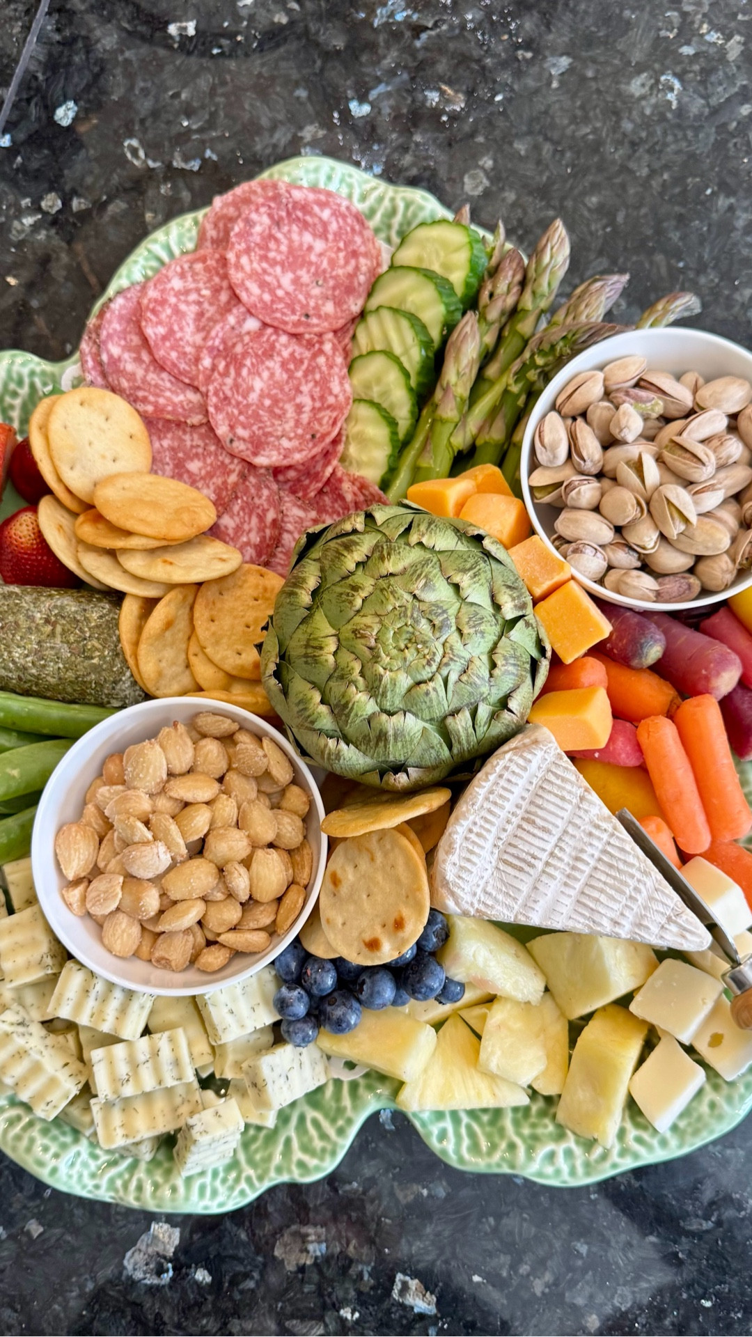 Spring has arrived!!!! Yea!! We are so excited to see the buds on the trees and the days getting warmer.
People start entertaining more and we feel a wonderful gift to bring to any get together is a cheese tray or charcuterie board.  
We have arranged a few spring charcuterie boards and thought we would share them today.🌞🌸🪻🌺🌷

