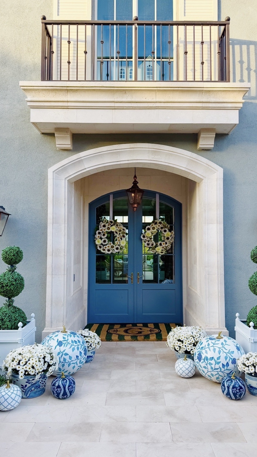 Blue and white fall porch! You’ll love these sunflower wreaths, blue and white pumpkins, faux zinnias and boxwood topiaries. The monogrammed doormat comes in single and double door sizes. The French planters also come in several colors.

#LTKHome #LTKSeasonal #LTKSaleAlert