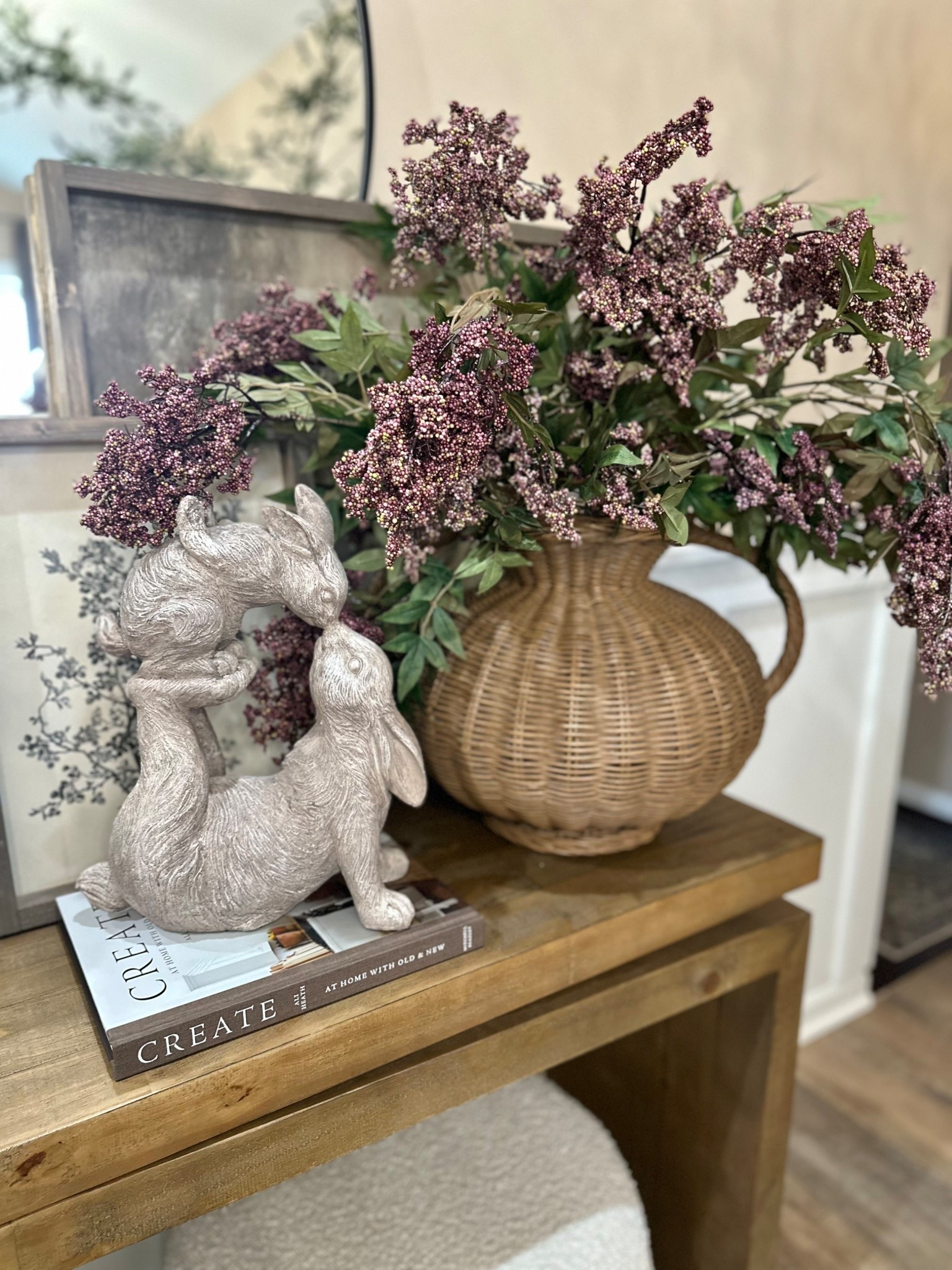 Spring Berry Stems Styled in a Woven Vase

Follow @farmtotablecreations on Instagram for more home styling ideas and finds.

These beautiful berry stems are one of my favorite easy ways to refresh a space for spring. I styled four stems in this woven vase and love how full and natural they look. The soft berry tones add just the right touch of color while still keeping that warm neutral feel. Paired with a stack of books and these sweet bunny accents, it creates such a cozy little vignette for a console, entry table, or shelf.

#homedecor #springdecor #vase #fauxstems #tabledecor #consoledecor #neutraldecor #homestyling

#LTKHome #LTKSaleAlert