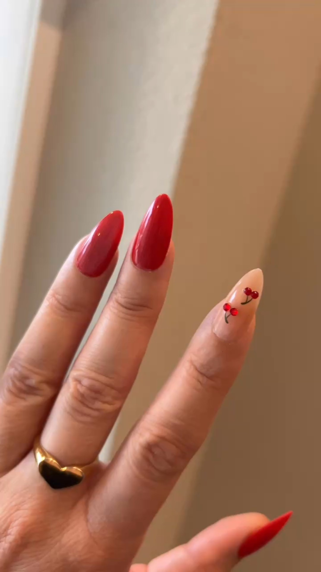 Cherry nails and gold signet ring / red press on nails 

#LTKStyleTip #LTKBeauty #LTKFindsUnder50