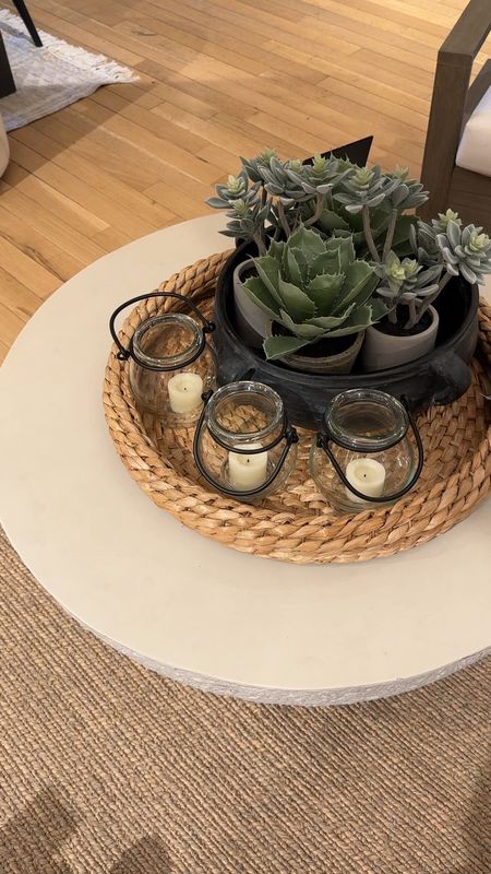 I love these handcrafted glass lanterns!  Add a little votive for some added outdoor ambiance.  This makes for the perfect coffee table centerpiece for your outdoor living space.  

#LTKVideo #LTKSaleAlert #LTKHome