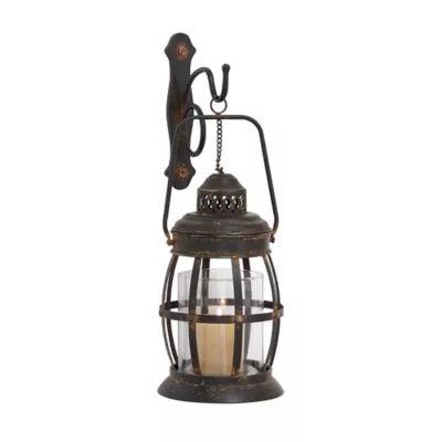 Ridge Road Décor Oval Lantern Iron/Glass Candle Sconce in Bronze | Bed Bath & Beyond