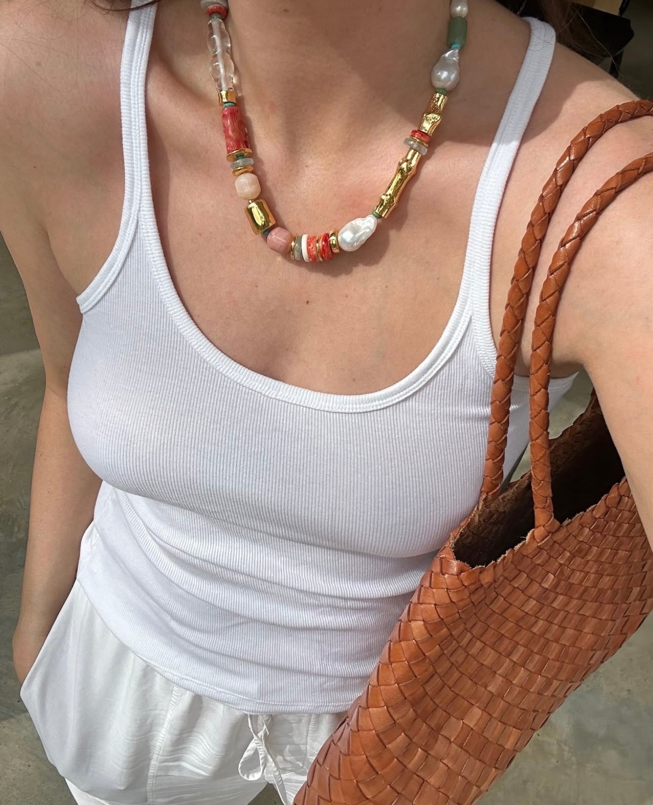 Easy summer layers: a white tank and linen trousers, but the main character is that colourful statement necklace. Best way to elevate summer whites. The perfect casual work-from-home or a laid-back brunch look.

Read all about my summer style report for Net a Porter on my Substack.


#LTKstyletip #LTKsummer