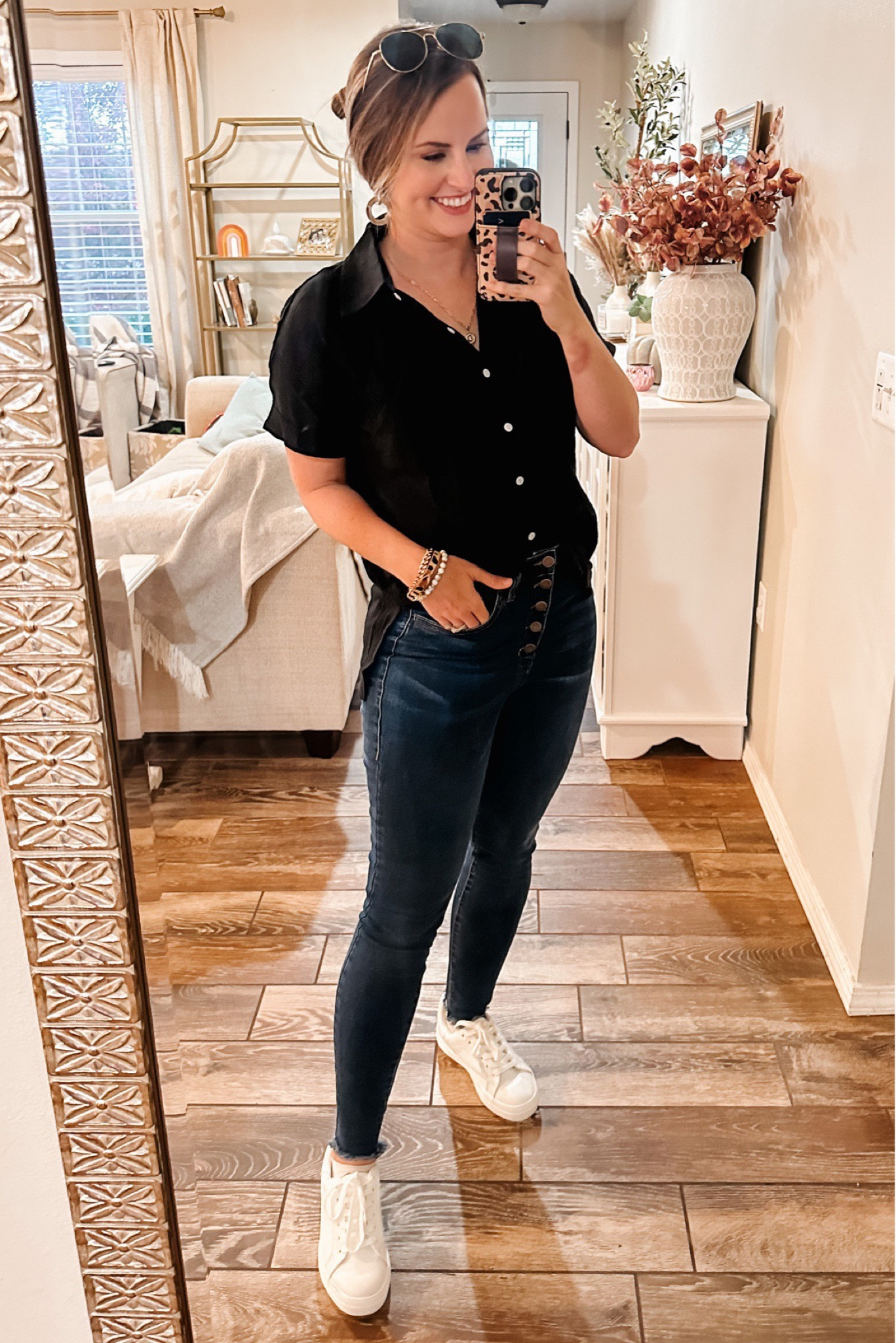 Cute summer to fall outfit! Casual outfit. Fall style. Black button down. 

Love this black button down. Top is $16.99 with code DOROTHYPRO 👌🏼 Great basic to wear now & pair it with a cardigan in the fall & winter.  Also cute unbuttoned over a tank or bodysuit! Wearing a size M. Comes in olive, pink, navy & white. 

Worn with my go-to dark skinny jeans with an exposed button fly & raw hem around ankle! Use code Dorothy20 for 20% off jeans (or anything at Pink Lily). Linked below. 

Follow my shop @dorothypro on the @shop.LTK app to shop this post and get my exclusive app-only content!

#liketkit #LTKSeasonal #LTKunder50 #LTKstyletip
@shop.ltk
https://liketk.it/3S48G