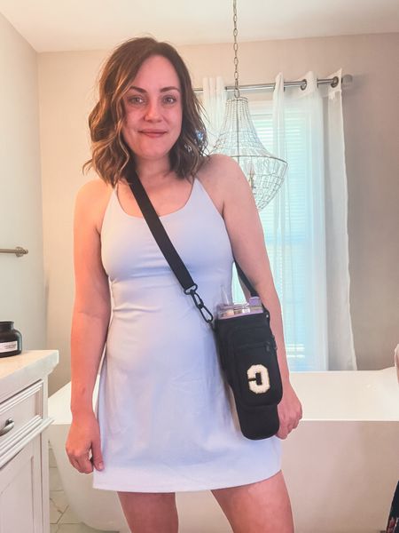 On my way to the ball field. This tennis dress is the perfect mom outfit, and I love having this carrier for my Stanley cup, phone, and cash. 


Summer outfits 
Summer fashion 
Summer activewear 
Summer fits 
Summer style 
Tennis dress
Pickleball 
Country concert 
Wedding guest 
Travel outfit 
Vacation outfit 

#LTKActive #LTKSaleAlert #LTKSeasonal