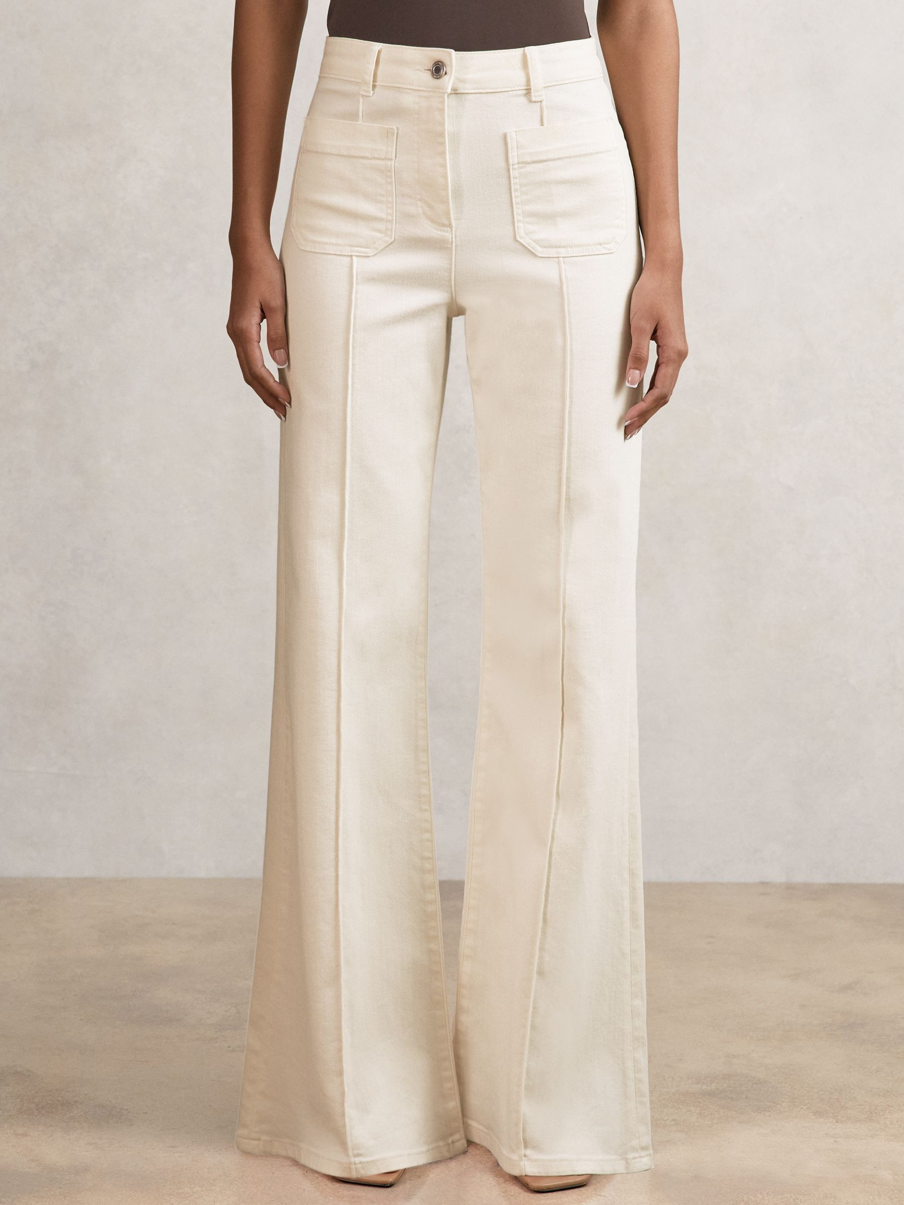 Patch-Pocket Flared Jeans in Ecru | Reiss UK