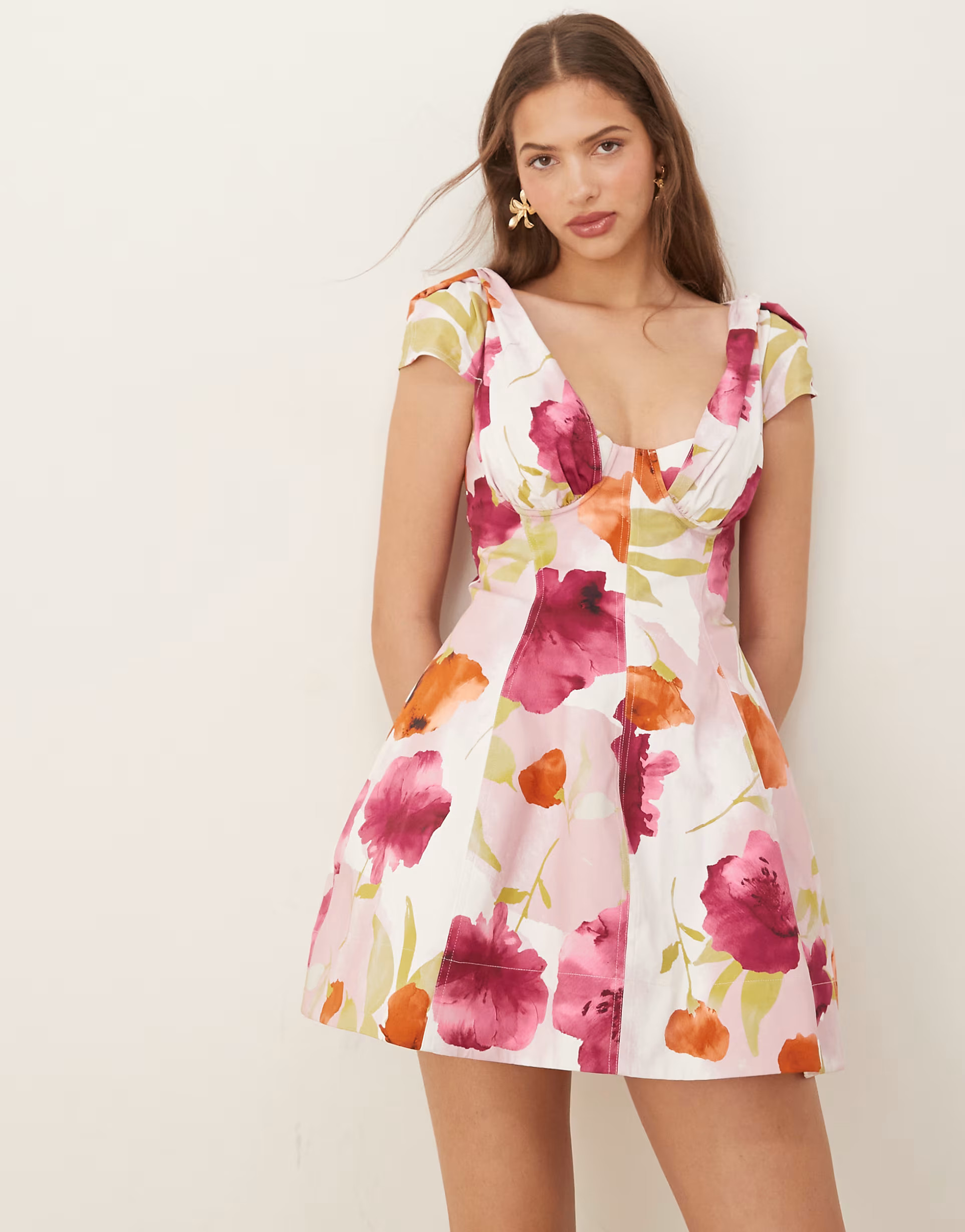 ASOS DESIGN structured bust seam detail cap sleeve mini dress in vibrant abstract print | ASOS (Global)