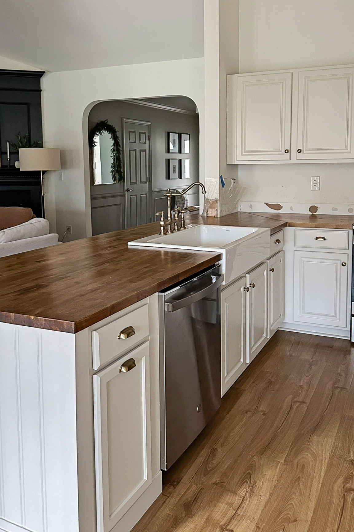 Details on my butcher block countertops, farmhouse sink, and vintage brass faucet

#LTKHome