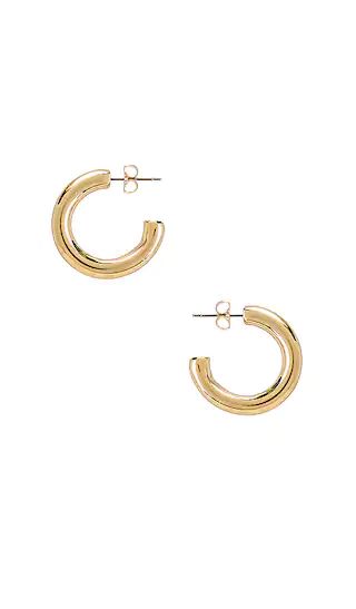 Harper Chunky Hoop Earrings في Gold | Revolve Clothing (Global)