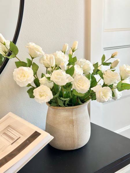Decorating tip: You can use a small planter pot as a vase! The mouth is wider so you just want to make sure you fill it full. Fold down the stems or cut them shorter!

• I used 10 stems here!

Faux florals, faux stems, spring decor, spring stems, vases, spring home decor, entryway decor, table decor, styling, home ideas

#LTKhome #LTKsalealert #LTKSeasonal