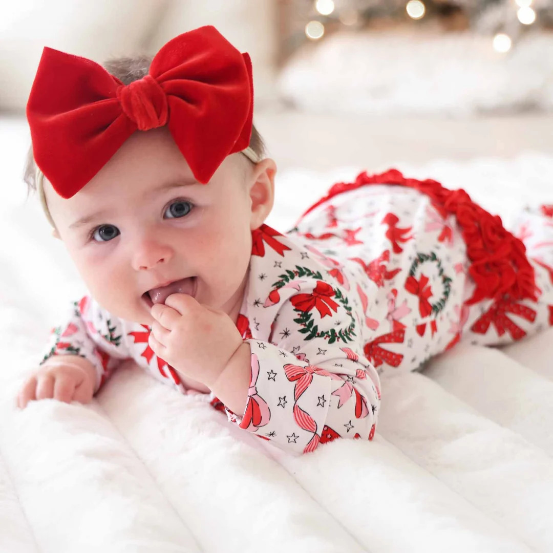 Wrapped In A Bow Ruffle Zipper Footie* | Caden Lane