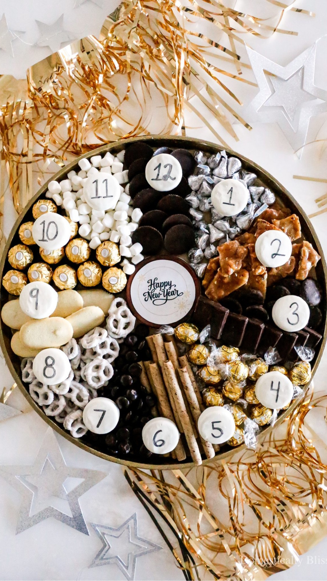 This New Year’s Eve Clock Dessert Charcuterie Board has 13 desserts and is topped with numbered cookies written with an edible marker.

See details:
https://domesticallyblissful.com/new-years-eve-clock-dessert-charcuterie-board/

🔗 Join our newsletter: https://domesticallyblissful.com/newsletter/ 

#LTKHome #LTKFindsUnder50 #LTKSeasonal