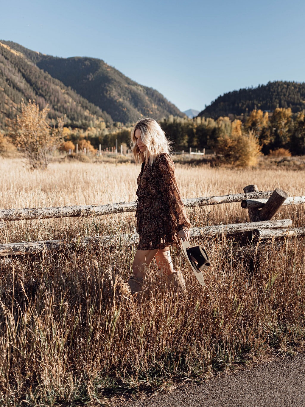 Autumn in the mountains called for something soft and storied — a paisley mini dress, worn boots, and a hat swinging from my hand. Western without trying too hard. 

 #LTKgrwm #LTKSeasonal #LTKTravel