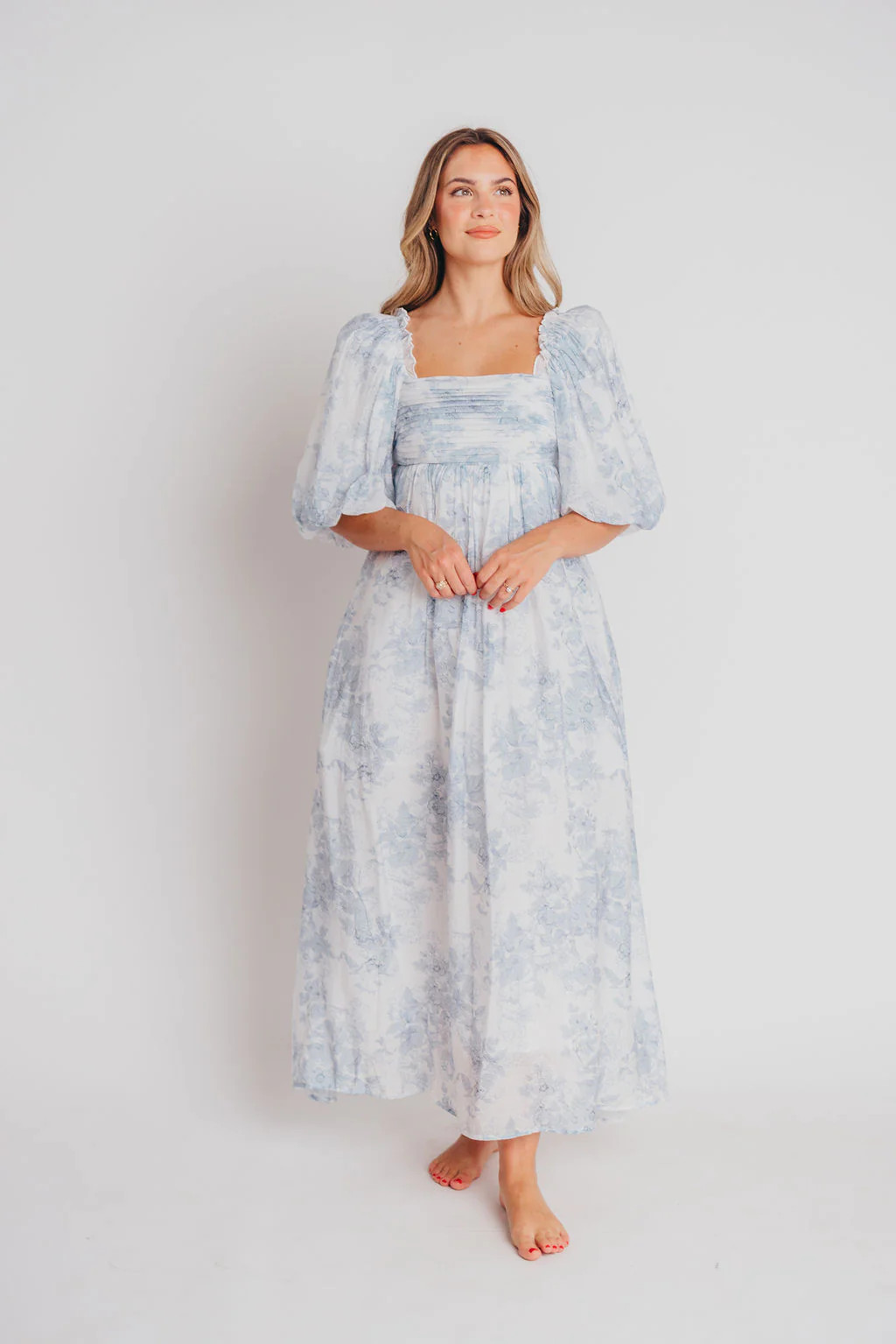 Melody Maxi Dress with Pleats and Bow Detail in Blue Floral- (S-3XL) B | Worth Collective