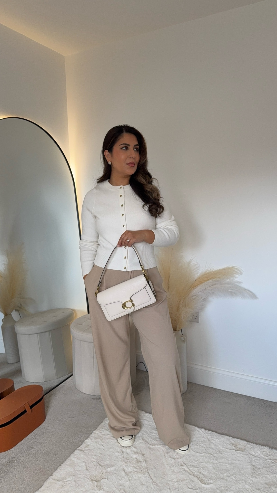 Modest autumn outfit ideas cream cardigan beige straight leg trousers coach tabby bag 

#LTKautumn #LTKmodest