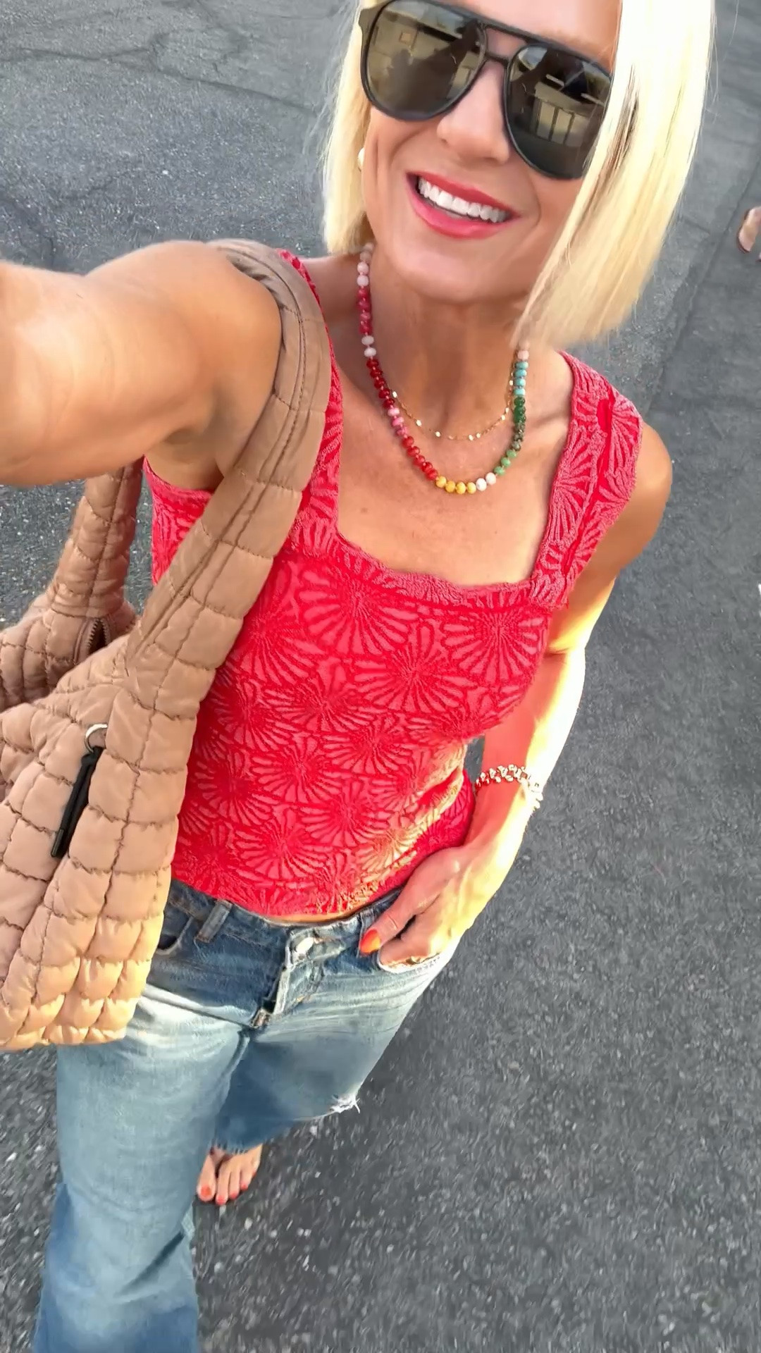 Can’t stop with these cute look for less FP tanks! There are several shops that sell these, and I linked my favorite— the color you see me wearing is accurate vs the more muted, darker red online. 
Size up in jeans for a looser fit.

#LTKmomlife #LTKootd #LTKOver40