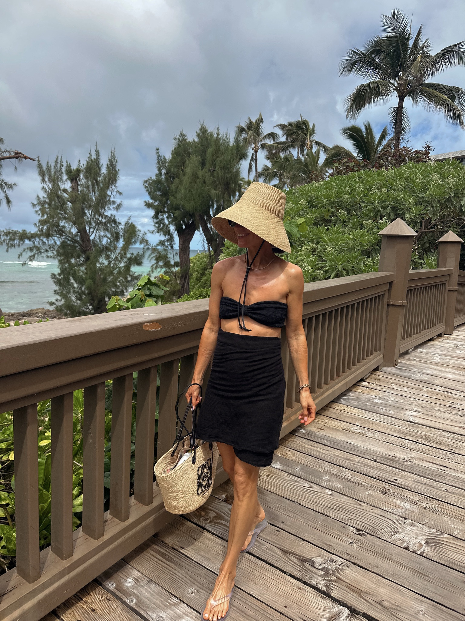 Beach day 
Took a long sarong, folded it in half and wrapped it tightly and tucked it into the back. 

#LTKPetite #LTKOver40