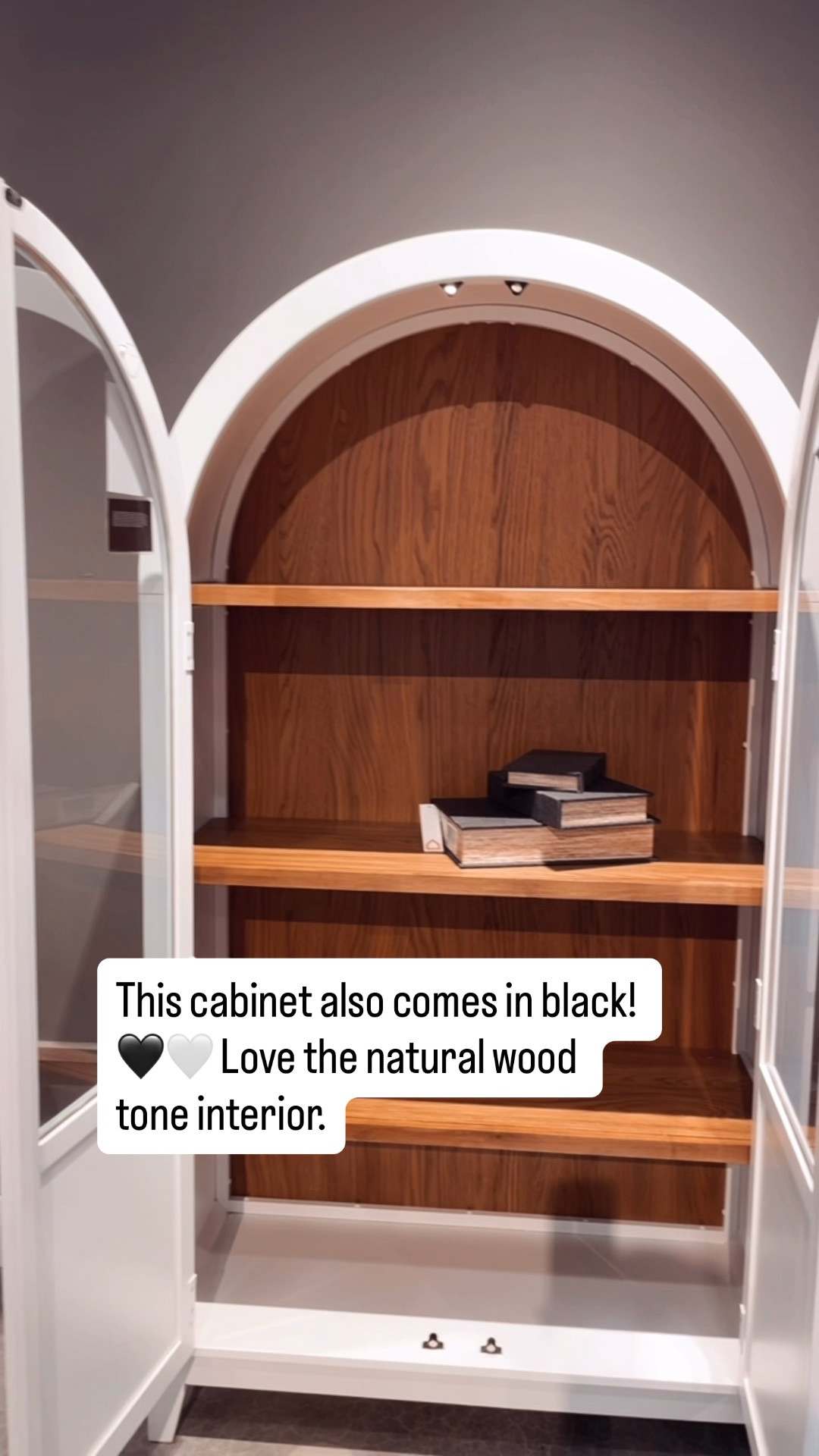 Arched curio cabinet comes with white or black exterior and natural wood interior. Perfect for a kitchen or dining room. 

One of my favorite display cabinets with glass doors from Ashley Home Store. 😍

#LTKHome