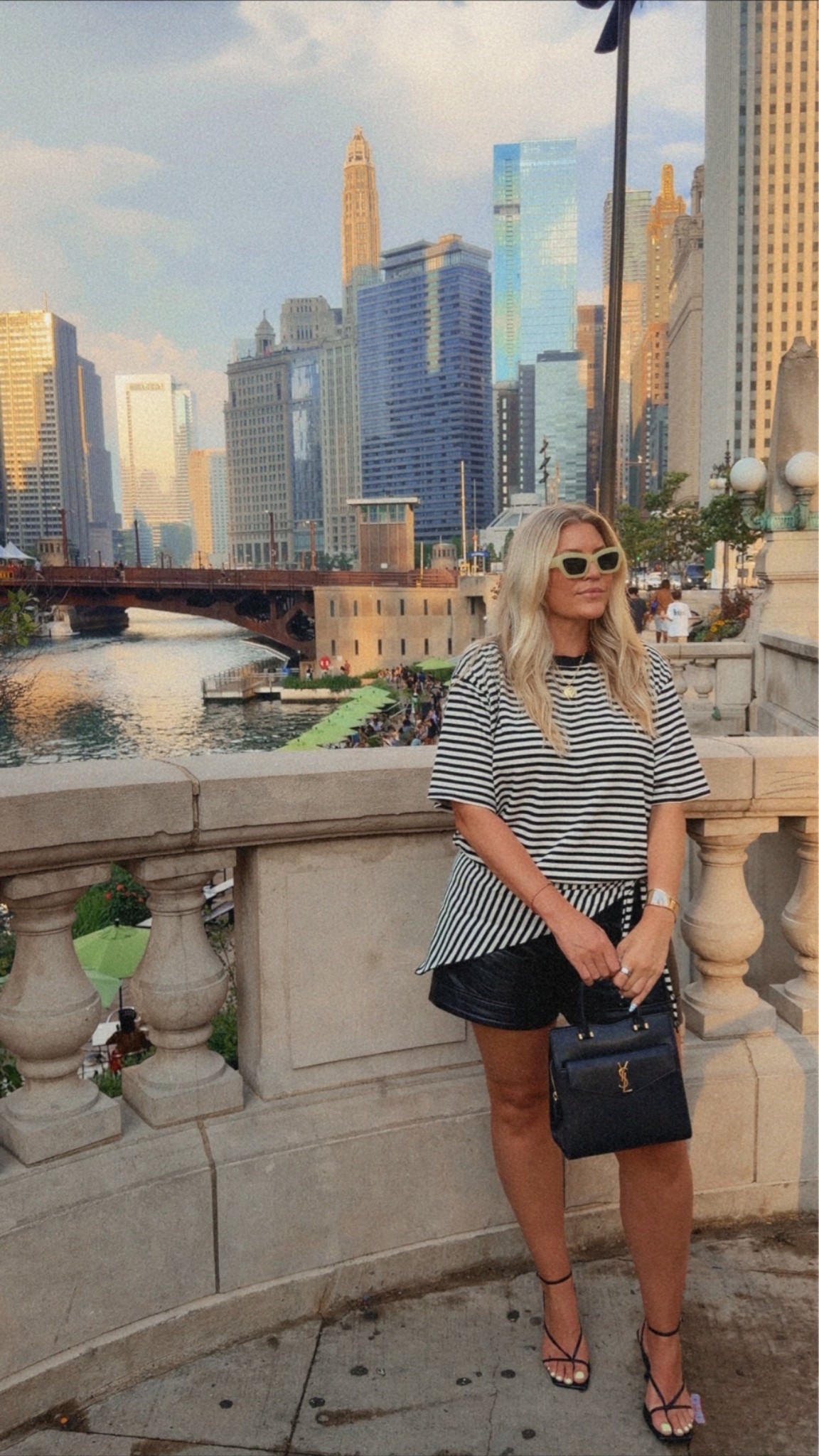 outfit for a night out in chicago! old leather agolde shorts paired with this fun lioness tee!