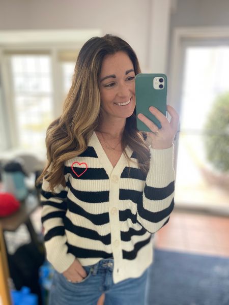 Striped sweater with a heart design, so cute and super cozy!! Im wearing a small and it’s plenty big and long enough. They have matching sweaters for girls too! Such an easy Valentine’s Day outfit or everyday casual wear. 

#LTKstyletip #LTKkids #LTKMostLoved