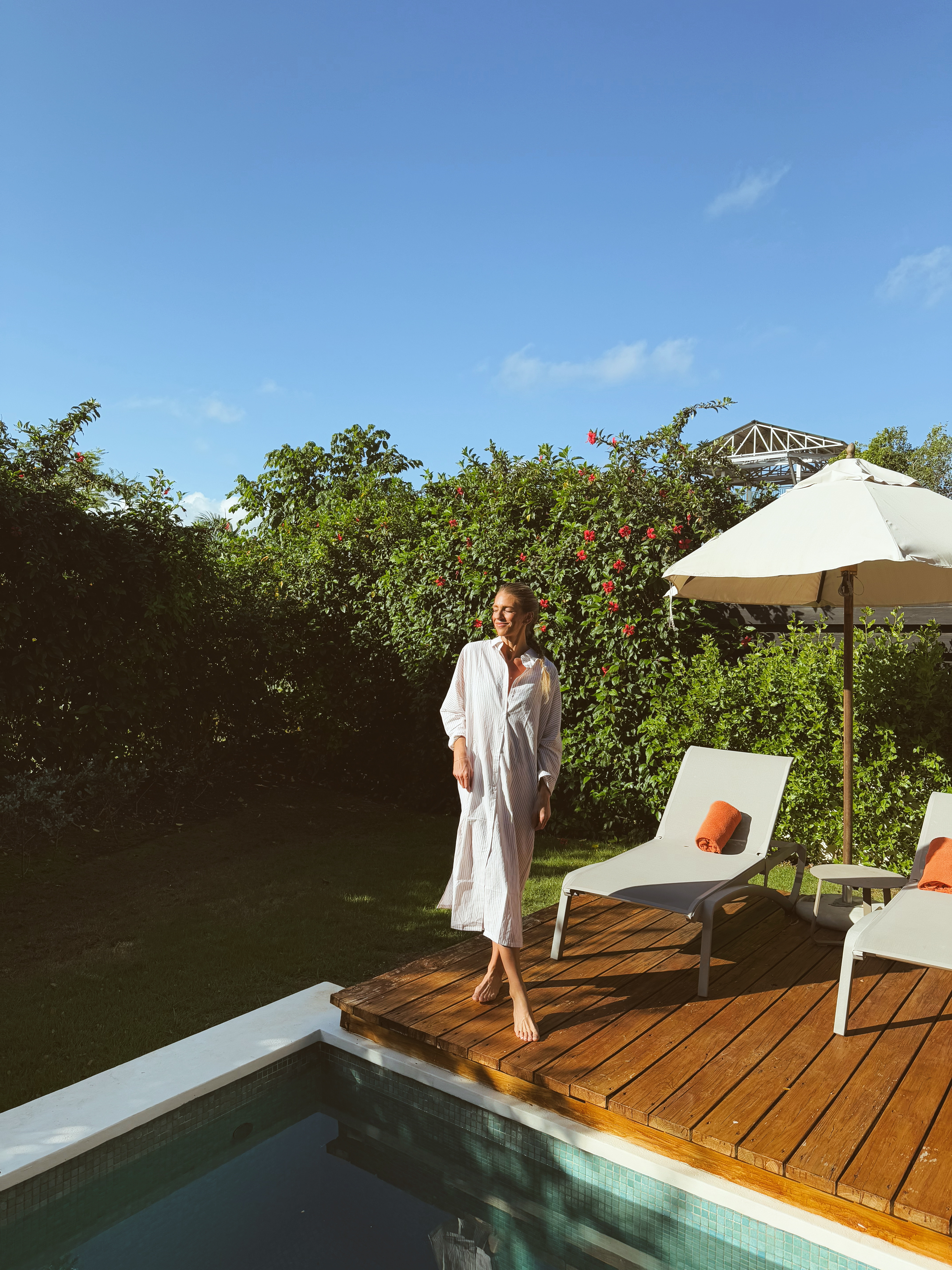 Coverup runs oversized. Wearing small. No need to size up if anything size down