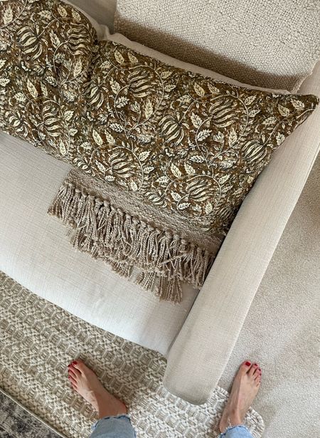 Floral throw pillow and cotton ivory throw blanket from @purplerosehome