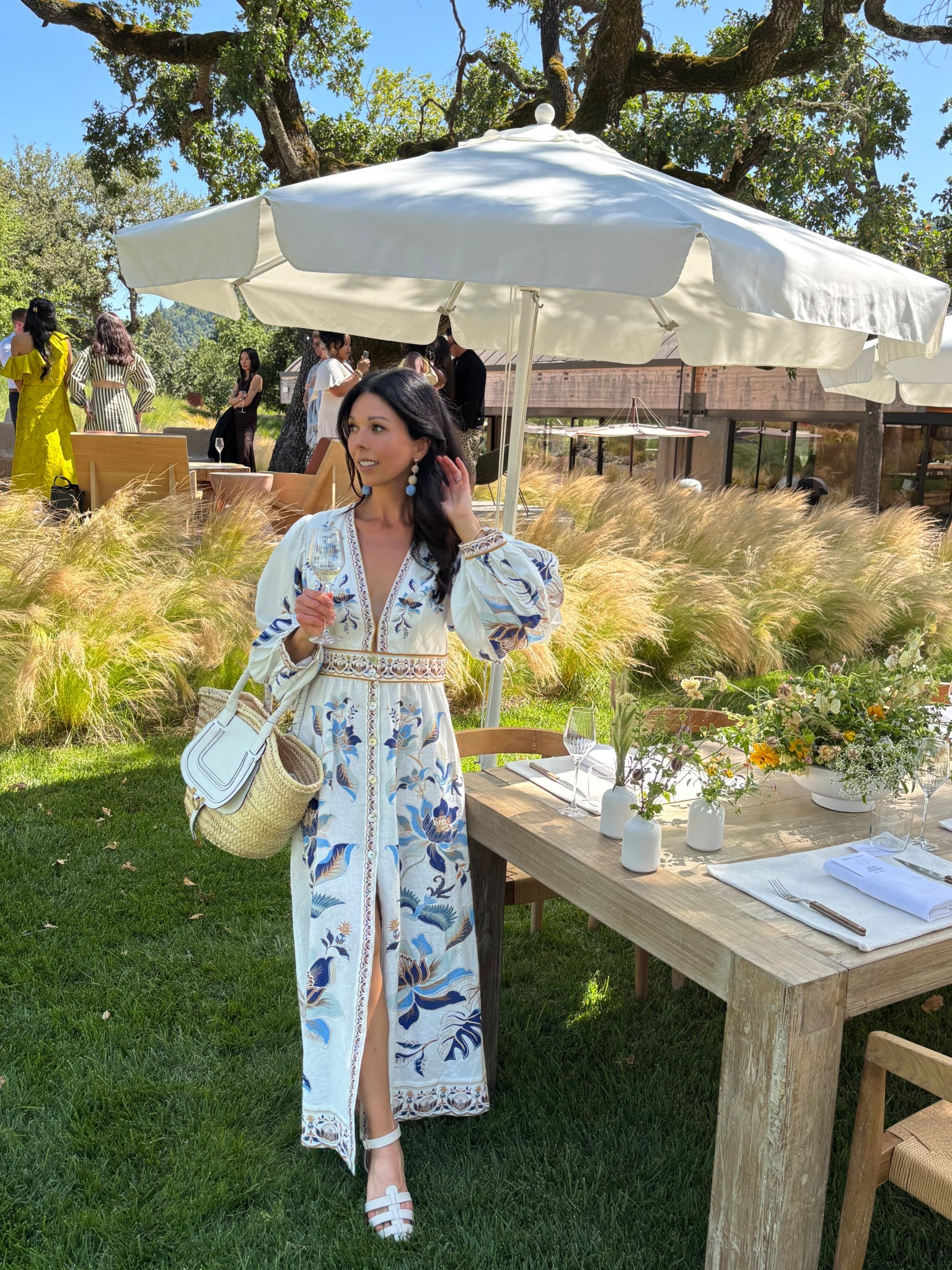 Summer hues of blue 🩵 
- SALE alert.. My dress is so beautifully made. I wore it to an event in Napa Valley and got so many compliments. It runs true to size. I’m wearing a size small here. The linen blend makes it perfect for warm weather. 50% off right now! 
- These statement earrings are PERFECT with the blues in this dress. I love how lightweight they are.
- Chloe basket tote bag. 

Blue and white summer dress 
Farm Rio dress
Summer wedding guest dress 
Napa Valley wine tasting outfit

#LTKWedding #LTKSaleAlert #LTKSeasonal